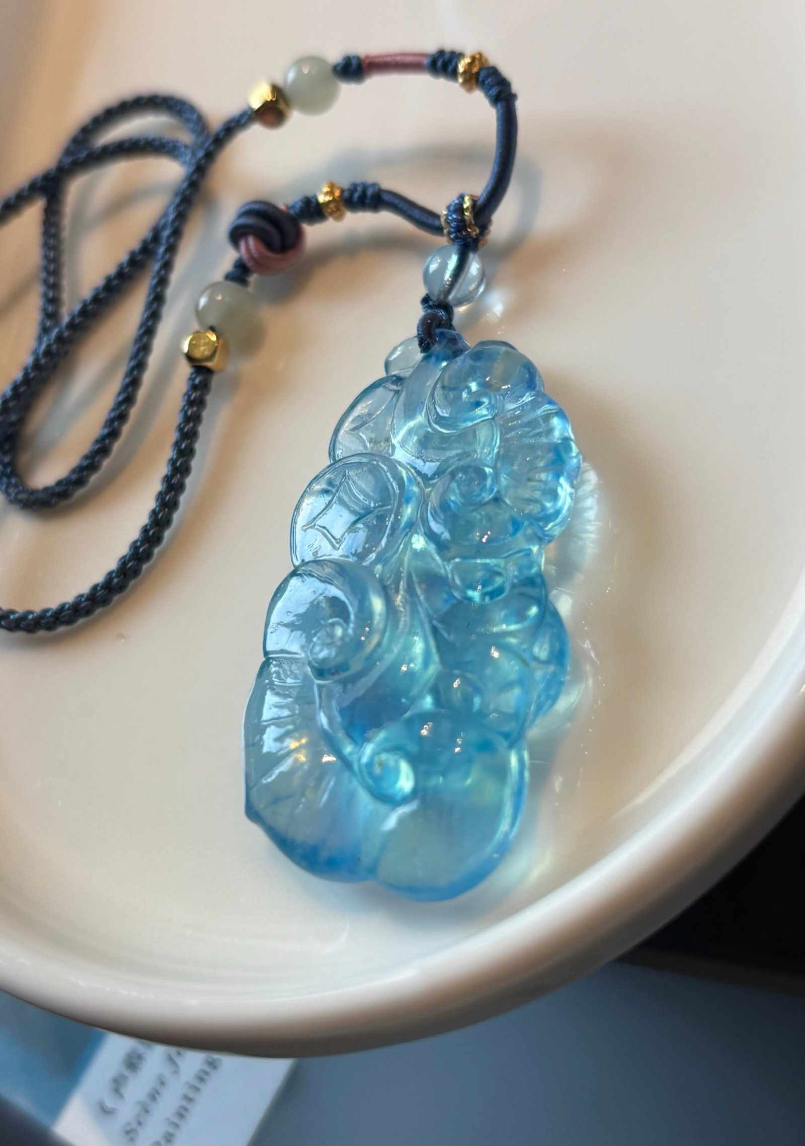 An Exquisite Aquamarine Ruyi Necklace: An Exquisite Aquamarine Ruyi Necklace,Size:42mmx22mmx9mm,Weight:13.2g 海蓝宝如意项链