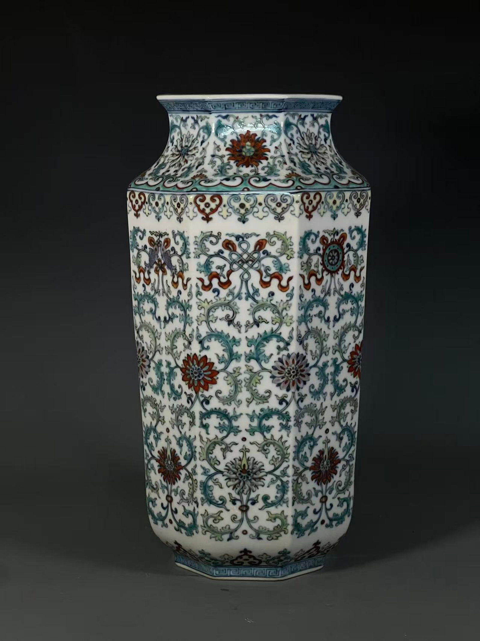 A Rare Doucai Lotus and Eight Treasures Pattern Vase: A Rare Doucai Lotus and Eight Treasures Pattern Vase,Qing Dynasty,China,Qianlong Six-character Mark,Size:15.6inx5.8inx4.9in 斗彩缠枝莲八宝纹瓶,