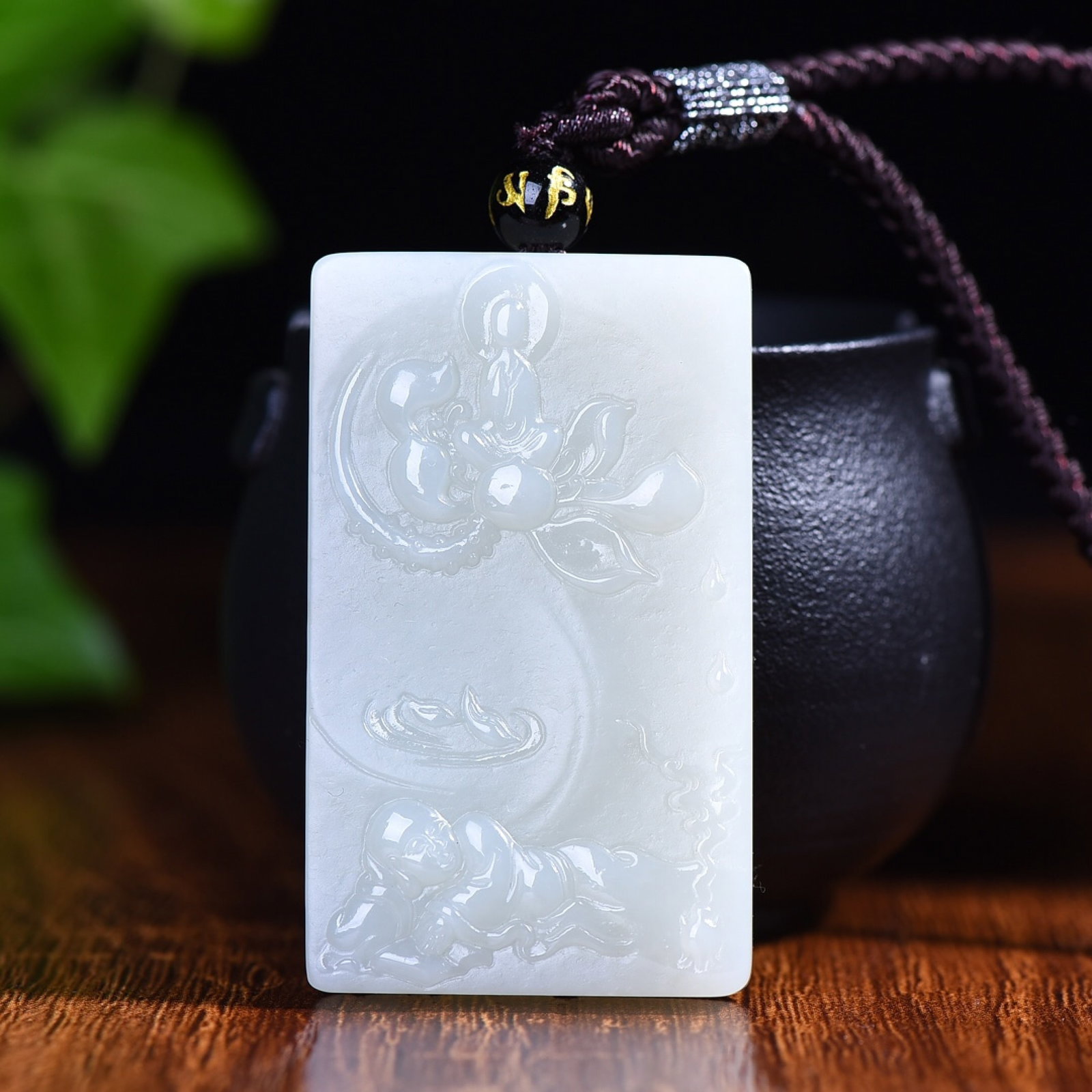 An Exquisite White Jade Buddha Pattern Pendant: An Exquisite White Jade Buddha Pattern Pendant,Size:34mmx57mm (寓意)寓意吉祥 永恒宁静的象征 白玉佛ࠔ