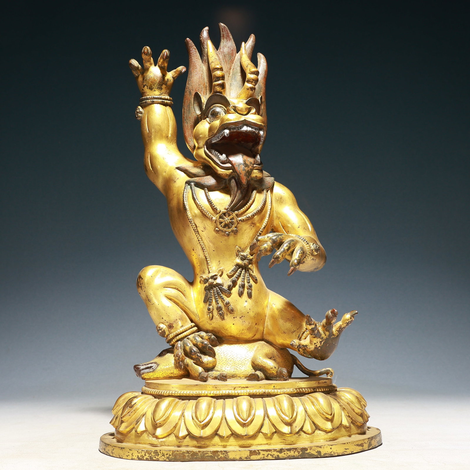 A Solemn Gilt Bronze Auspicious Beast Ornament: A Solemn Gilt Bronze Auspicious Beast Ornament,Qing Dynasty,China,Size:10.2inx11inx17.3in,Weight:11300g 铜鎏金瑞兽摆件,中国清代