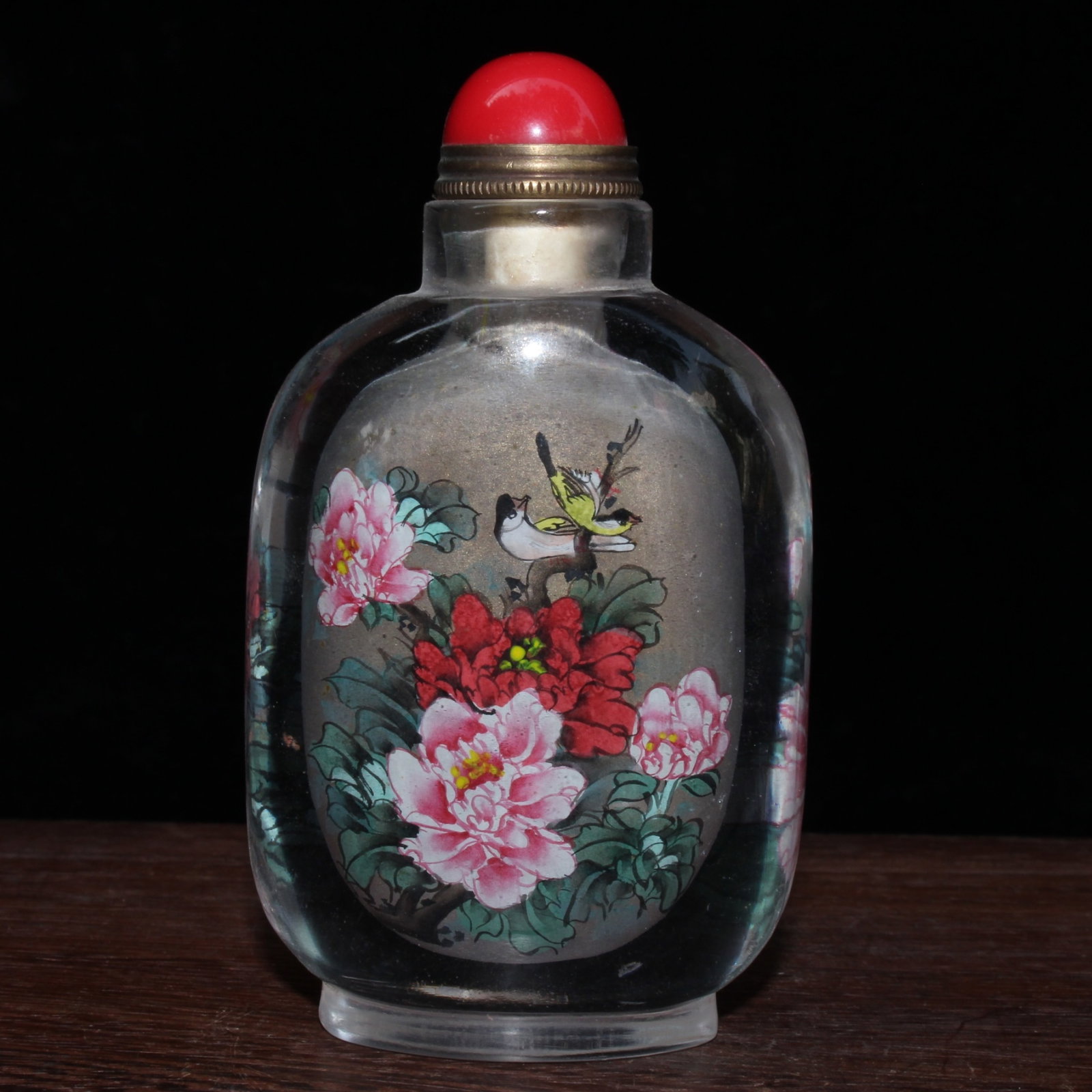 An Exquisite Glass Flower and Bird Pattern Snuff Bottle: An Exquisite Glass Flower and Bird Pattern Snuff Bottle,Qing Dynasty,China,Size:2.2inx1.2inx3.9in,Weight:165g 琉璃花鸟纹鼻烟壶,中国清&