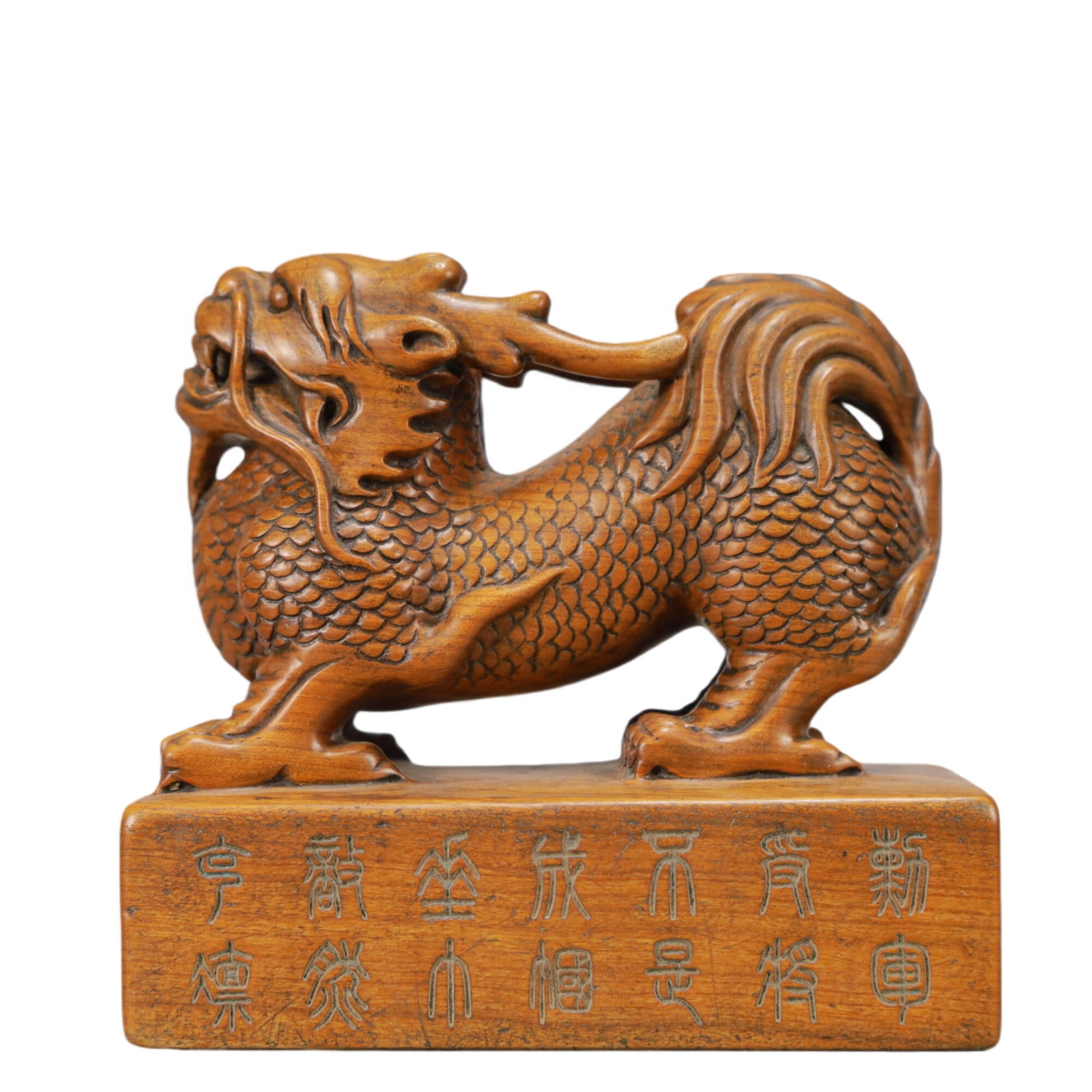 An Exquisite Sandalwood Kylin Seal: An Exquisite Sandalwood Kylin Seal,Qing Dynasty,China,Size:4.1inx2.4inx3.8in,Weight:350g 檀香木麒麟印章,中国清代