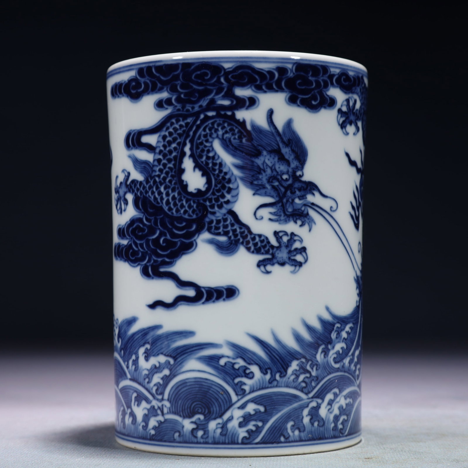 An Exquisite Blue and White Seawater and Dragon Pattern Brush Pot: An Exquisite Blue and White Seawater and Dragon Pattern Brush Pot,Qing Dynasty,China,Yongzheng Six-character Mark,Size:3.7inx5.3in,Weight:450g
