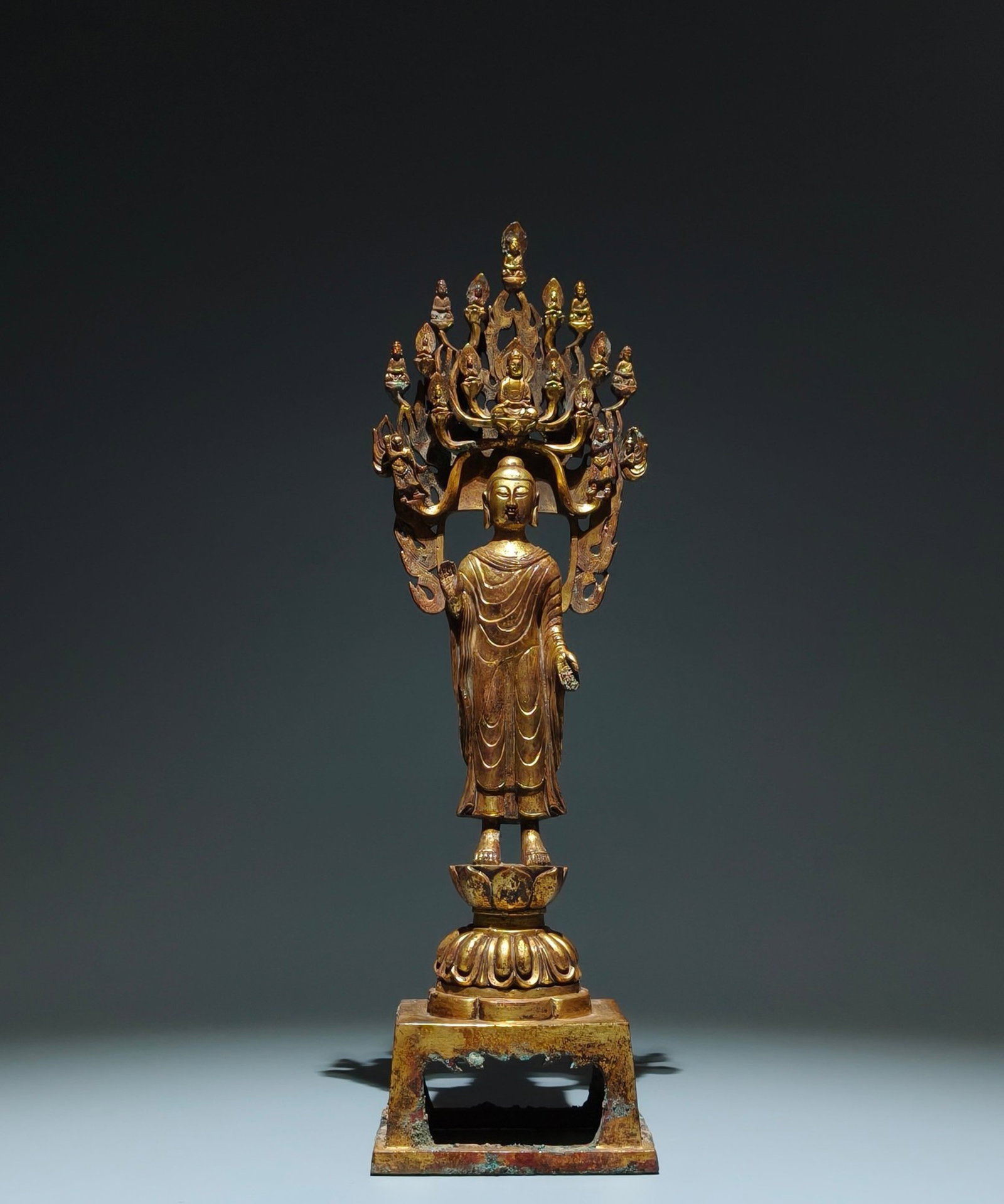 A Solemn Gilt Bronze Buddha Statue: A Solemn Gilt Bronze Buddha Statue,N.Wei,China,Size:16.1inx4.9inx3.5in 铜鎏金佛像,中国北魏时期