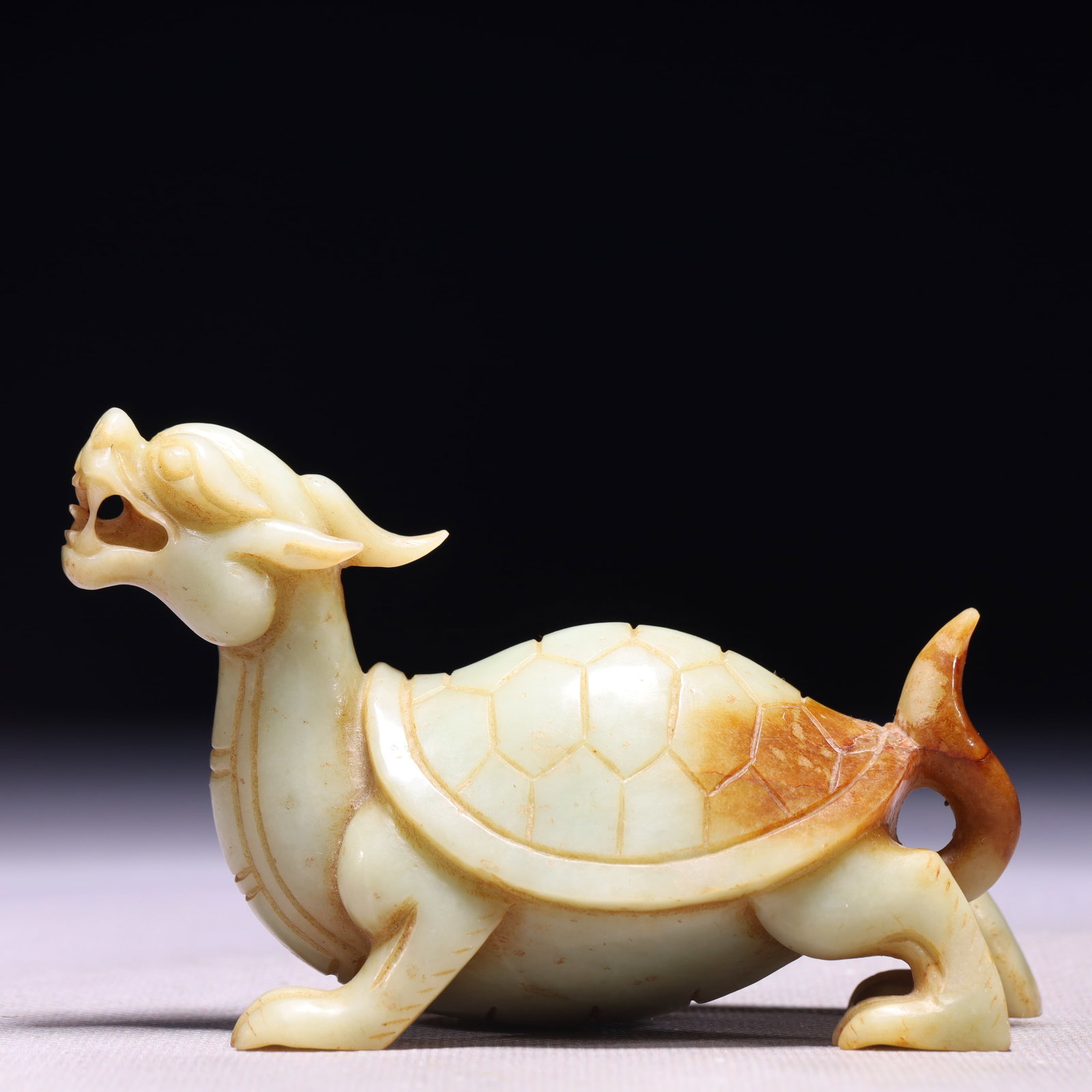 An Exquisite White Jade Auspicious Beast Ornament: An Exquisite White Jade Auspicious Beast Ornament,Qing Dynasty,China,Size:4.3inx2inx2.8in,Weight:263g 白玉瑞兽摆件,中国清代