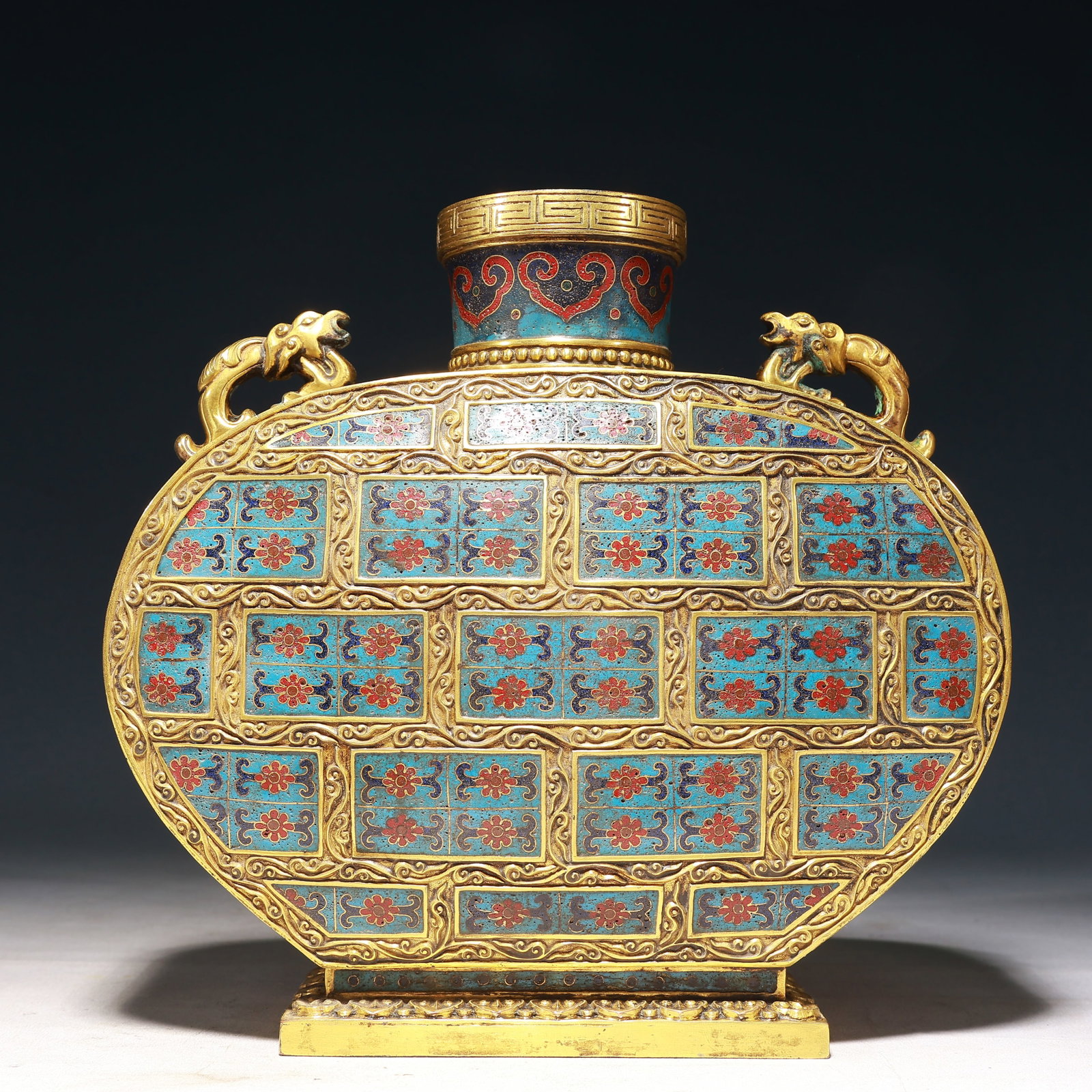 An Exquisite Cloisonne Flower Pattern Dragon-Ears Vase: An Exquisite Cloisonne Flower Pattern Dragon-Ears Vase,Qing Dynasty, China,Qianlong Four-character Mark,Size:10.8inx3.3inx10.6in,Weight:2800g 景泰蓝花卉纹龙&#