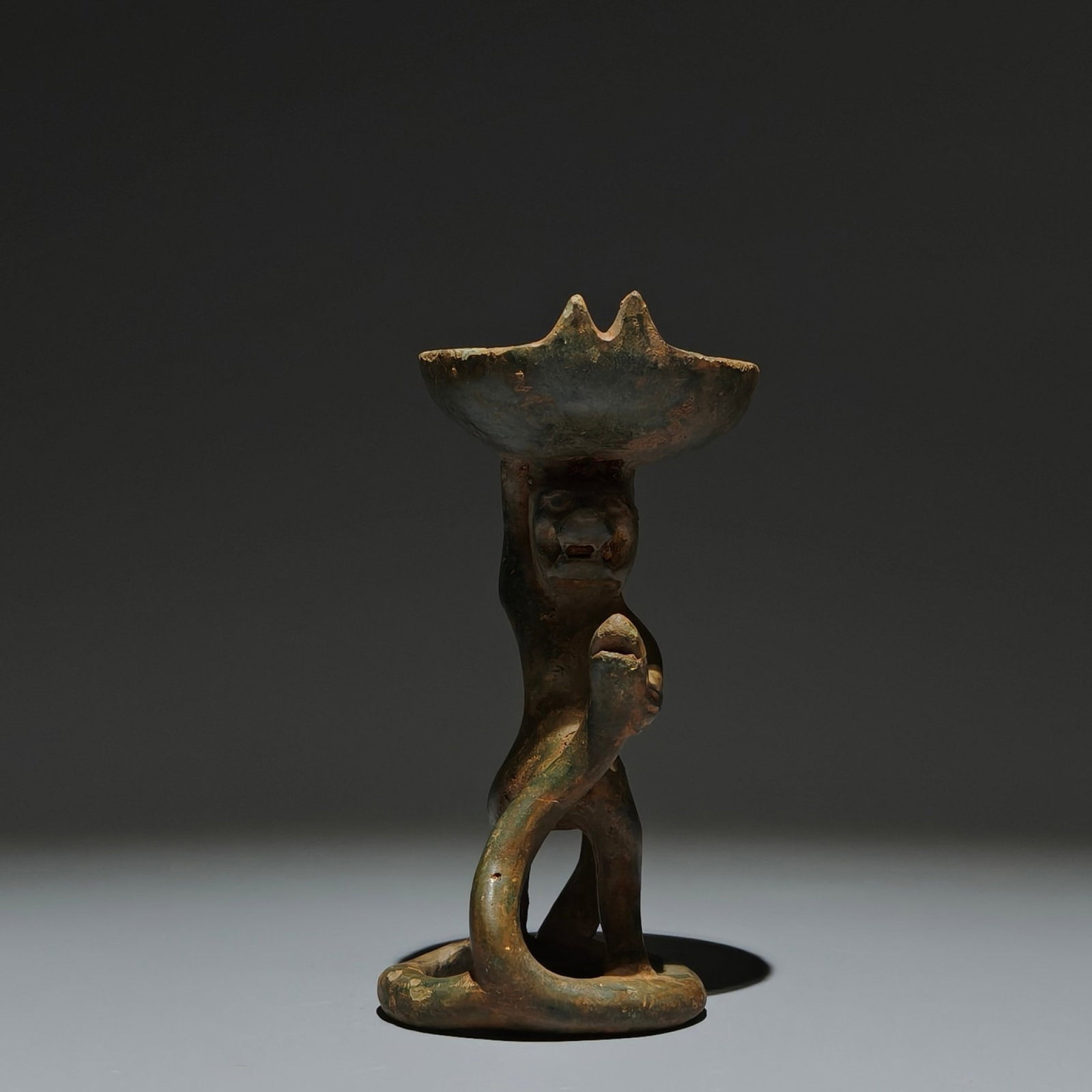 An Archaic Bronze Bear Candlestick: An Archaic Bronze Bear Candlestick,the Warring States period in China,Size:5.5inx3.1inx2.8in 青铜熊烛台,中国战国时期