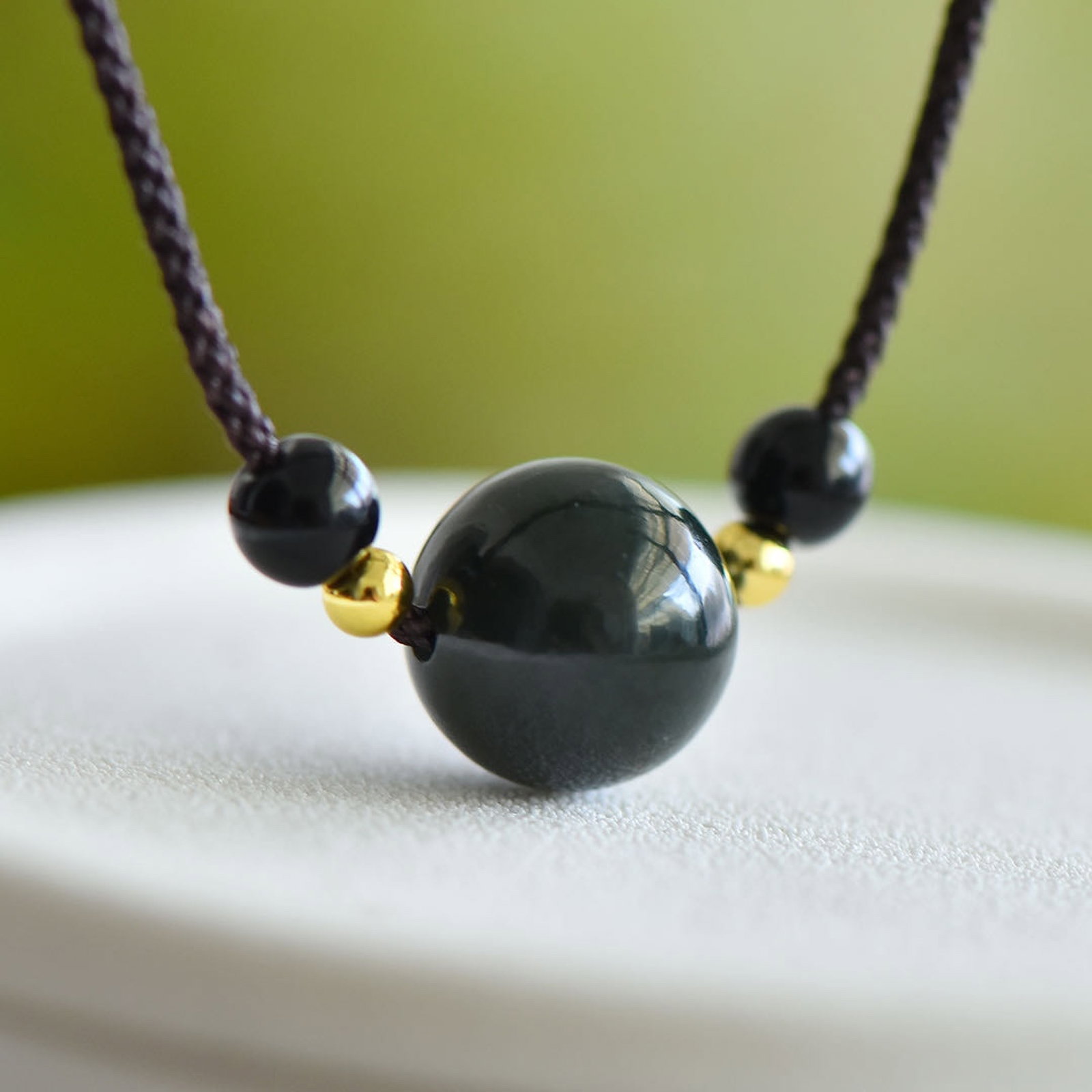 An Exquisite Sapphire Pendant: An Exquisite Sapphire Pendant,Size:14mm 青玉吊坠