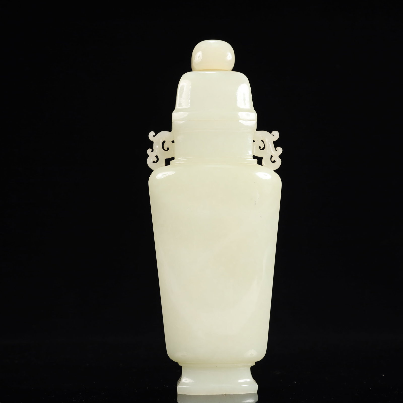 An Exquisite White Jade Double-Ears Bottle: An Exquisite White Jade Double-Ears Bottle,Qing Dynasty, China,Size:3.1inx1.6inx8.7in,Weight:500g 白玉双耳盖瓶,中国清代