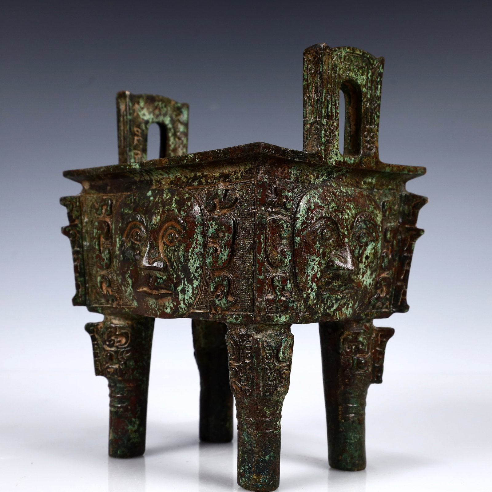 A Rare Bronze Human-Face Pattern Ding - 4