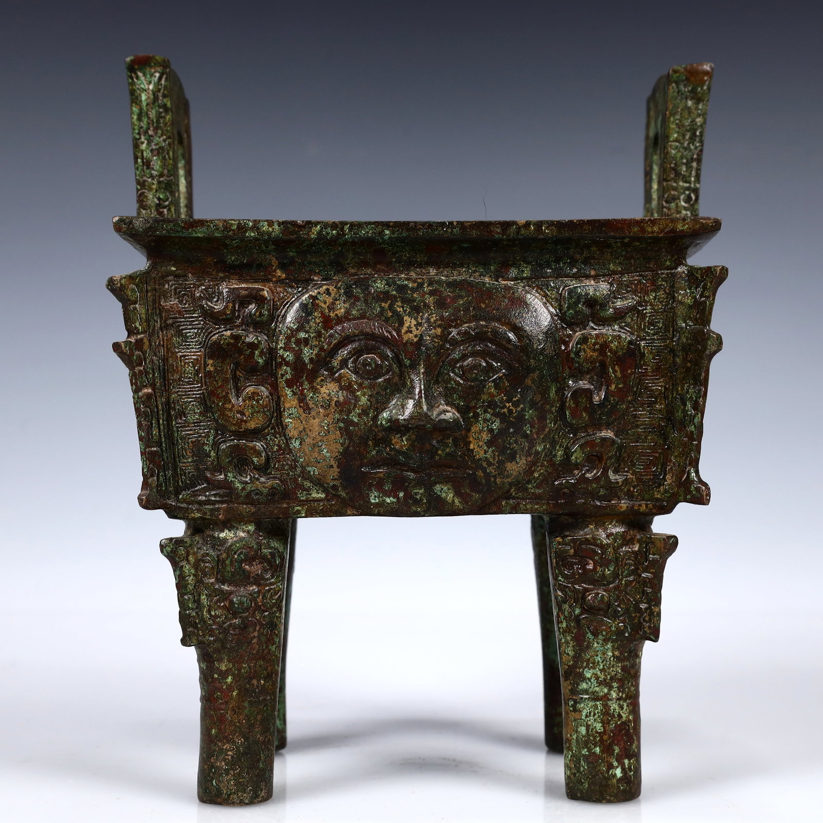 A Rare Bronze Human-Face Pattern Ding - 6