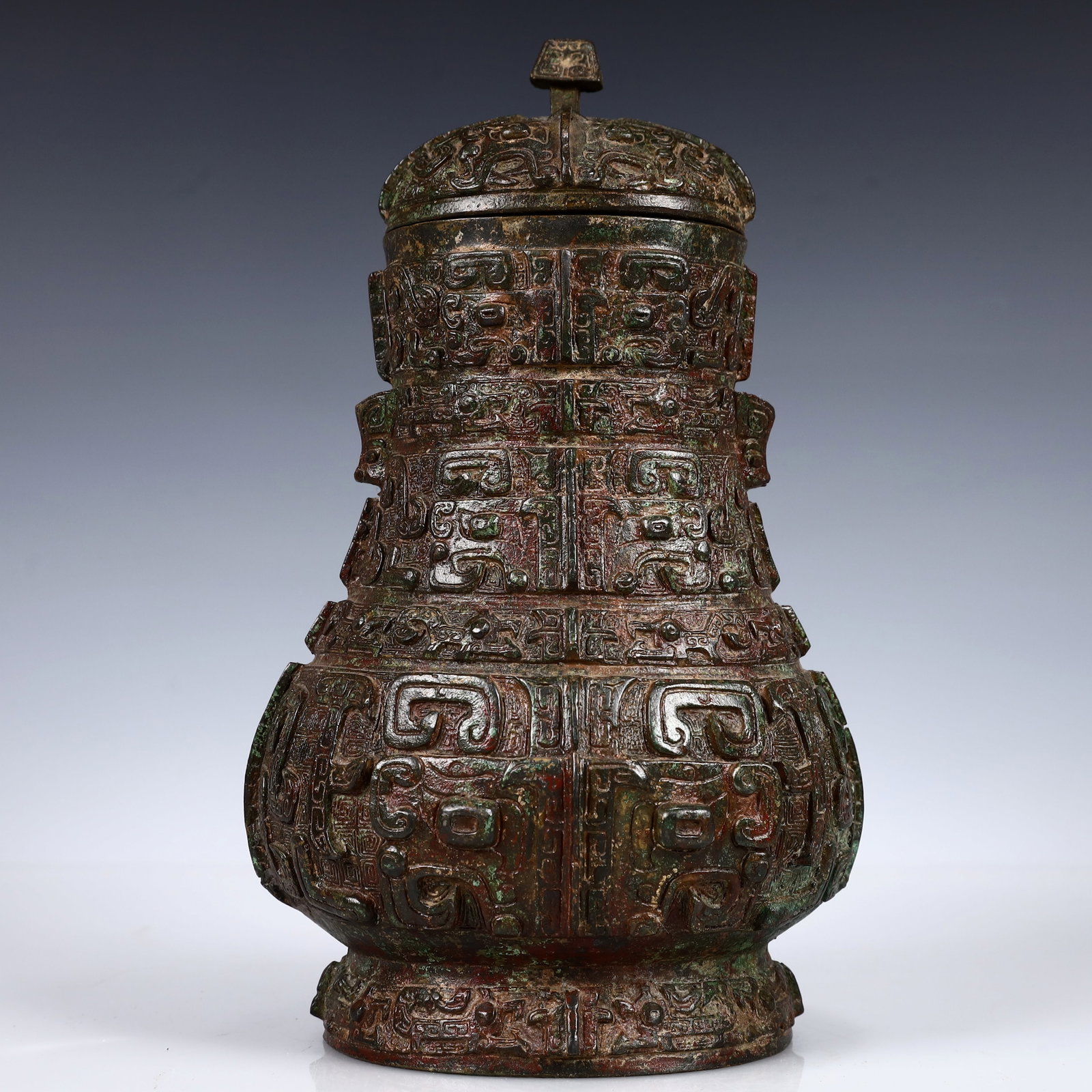 A Rare Bronze Beast Pattern Bottle,With Inscription: A Rare Bronze Beast Pattern Bottle,With Inscription,W.Zhou,China,Size:6.7inx5.5inx10.6in,Weight:2600g 青铜兽纹瓶带盖,带铭文,中国