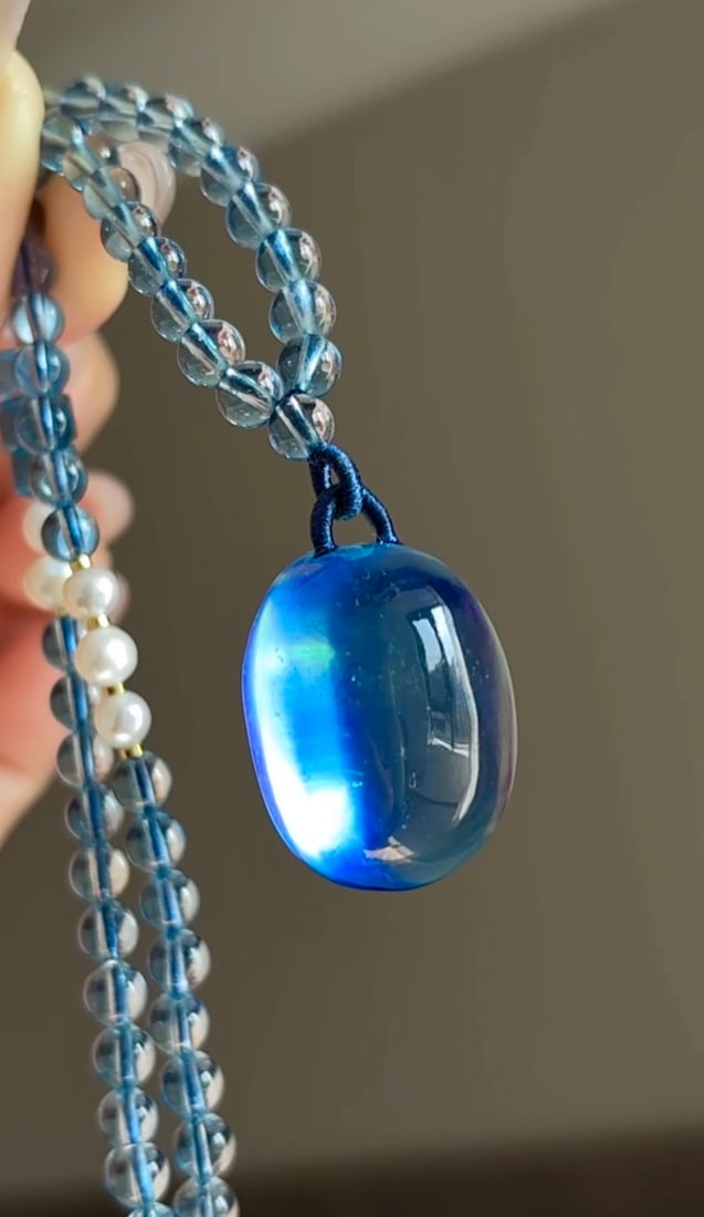 An Exquisite Aquamarine Pendant: An Exquisite Aquamarine Pendant,Size:24mmx18mmx13mm,Total Weight:28g 海蓝宝吊坠