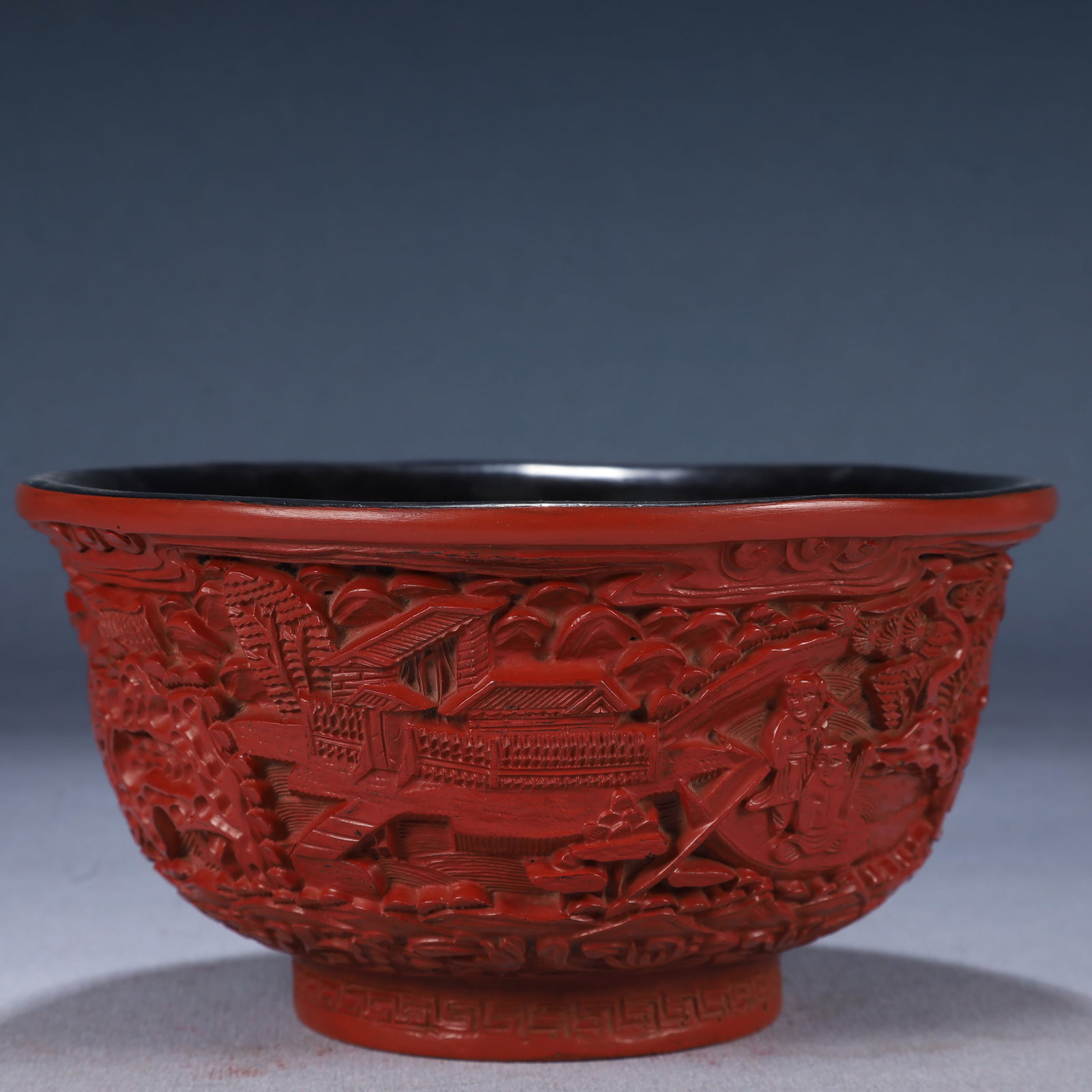 An Exquisite Carved Red Lacquer Landscape and Figure Pattern Bowl: An Exquisite Carved Red Lacquer Landscape and Figure Pattern Bowl,Qing Dynasty, China,Qianlong Four-character Mark,Size:6.3inx3.1in,Weight:250g 剔红漆山水人物