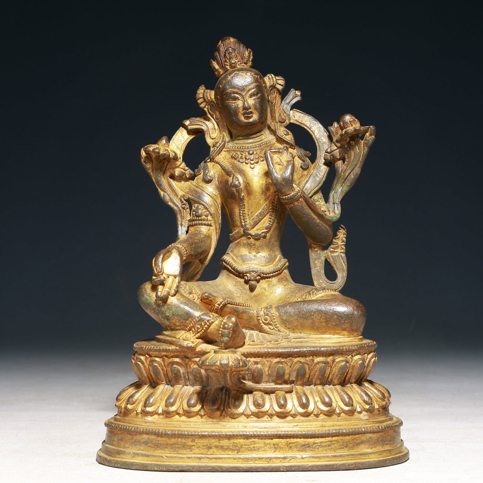 A Solemn Gilt Bronze Buddha Statue: A Solemn Gilt Bronze Buddha Statue,Qing Dynasty,China,Size:5.9inx3.9inx8.7in,Weight:2600g 铜鎏金佛像,中国清代