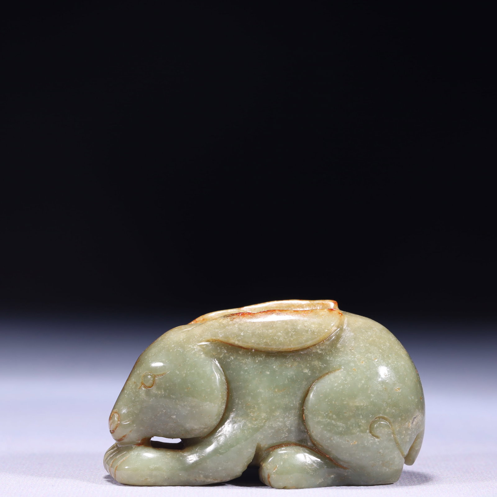 An Exquisite Green Jade Rabbit Ornament: An Exquisite Green Jade Rabbit Ornament,Qing Dynasty,China,Size:3inx1.4inx1.6in,Weight:213g 青玉兔子摆件,中国清代
