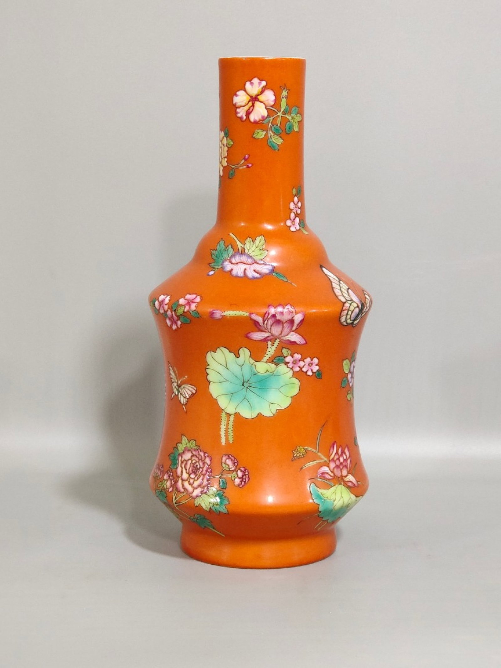 An Exquisite Coral Red Glazed Flower and Butterfly Pattern Vase: An Exquisite Coral Red Glazed Flower and Butterfly Pattern Vase,Qing Dynasty,China,Qianlong Six-character Mark,Size:8inx3.5in 珊瑚红花卉蝴蝶纹瓶,&