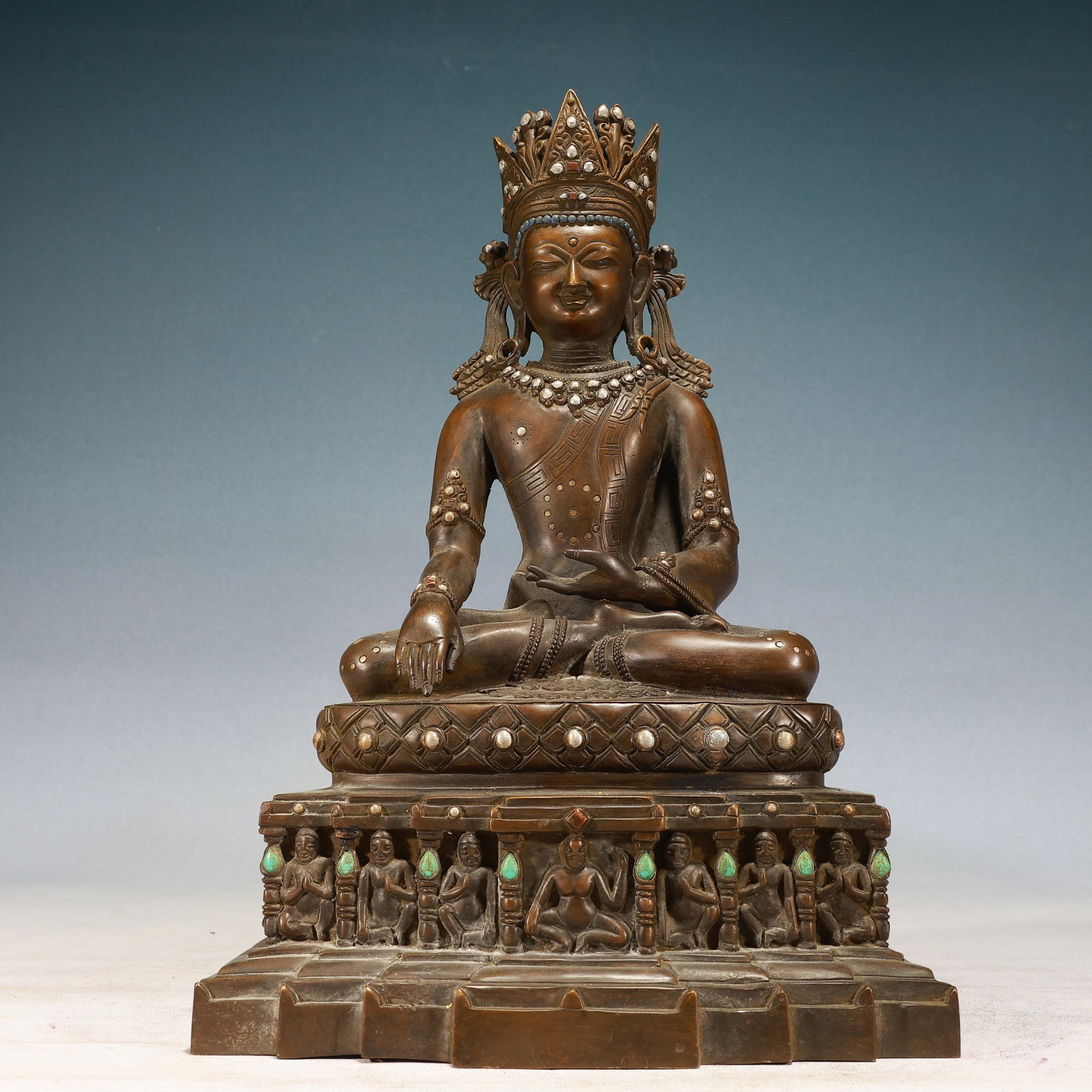 A Solemn Bronze Inlaid Silver Statue of Amitayus: A Solemn Bronze Inlaid Silver Statue of Amitayus,Qing Dynasty, China,Size:10.2inxcmx15inx6.3in,Weight:9450g 铜嵌银无量寿佛像,中国清