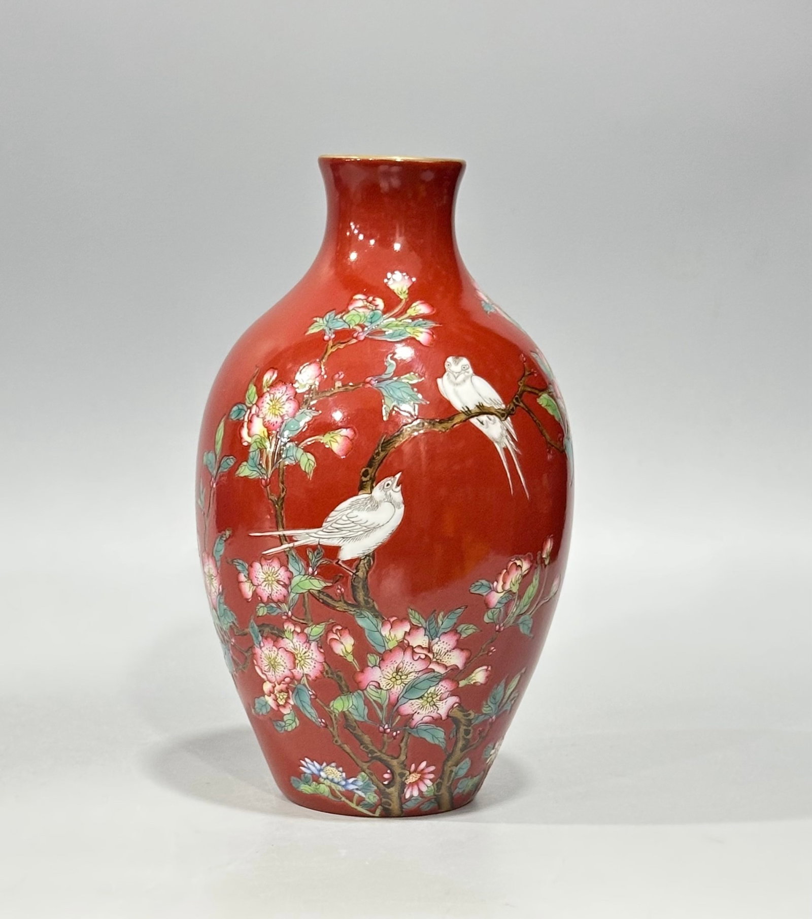 An Exquisite Coral Red Glazed Enamel Flower and Bird Pattern Vase: An Exquisite Coral Red Glazed Enamel Flower and Bird Pattern Vase,Qing Dynasty,China,Qianlong Four-character Mark,Size:6.7inx3.9in 珊瑚红珐琅彩花鸟ń