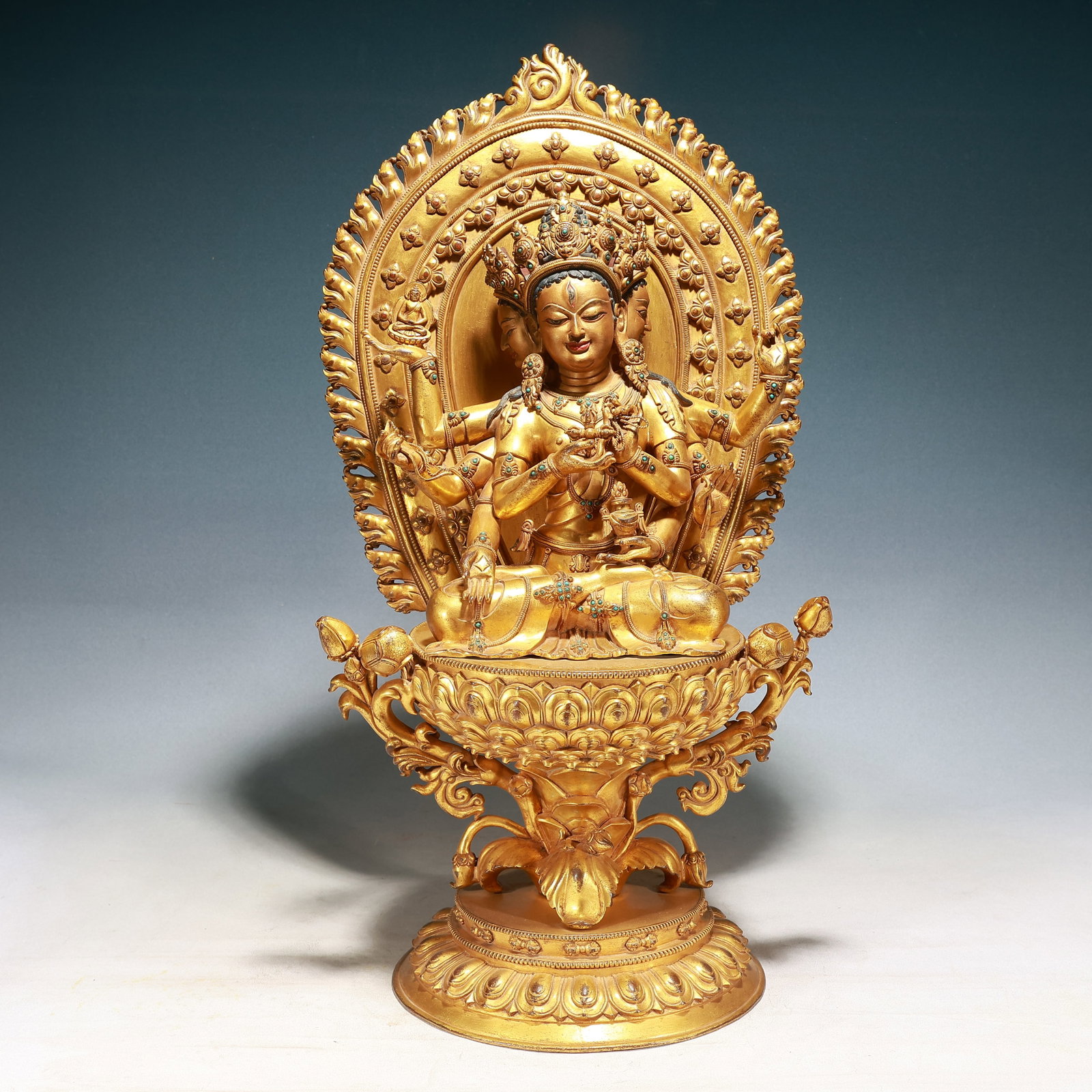 A Solemn Gilt Bronze Buddha Statue,Inlaid Turquoise,With Inscription: A Solemn Gilt Bronze Buddha Statue,Inlaid Turquoise,With Inscription,Qing Dynasty, China,Size:13.8inx8.7inx25.2in,Weight:20100g 铜鎏金佛像,嵌绿松石