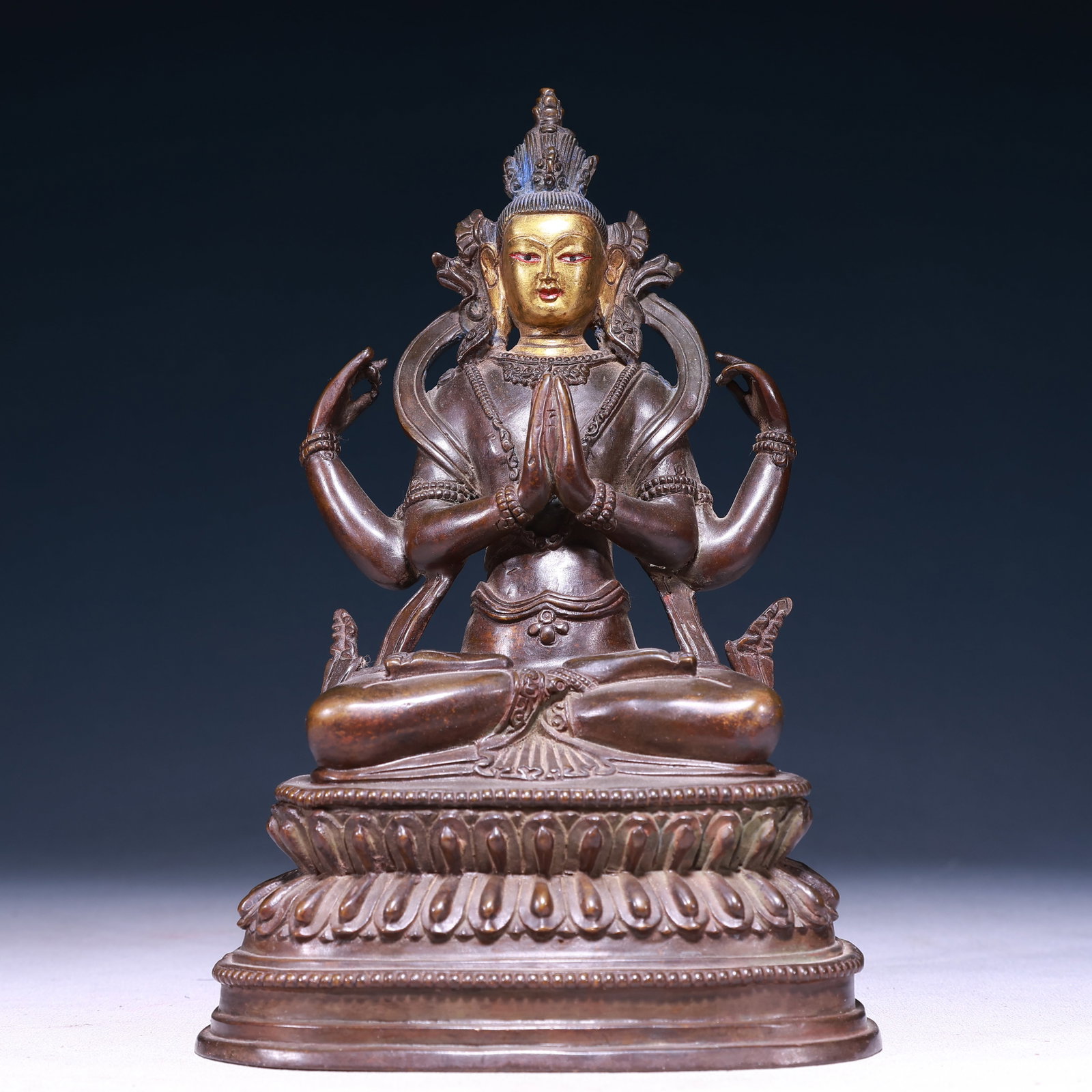 A Solemn Gilt Bronze Four-arms Statue of Avalokitesvara: A Solemn Gilt Bronze Four-arms Statue of Avalokitesvara,Qing Dynasty,China,Size:5.7inx3.5inx8.9in,Weight:2250g 铜鎏金四臂观音像,中国清