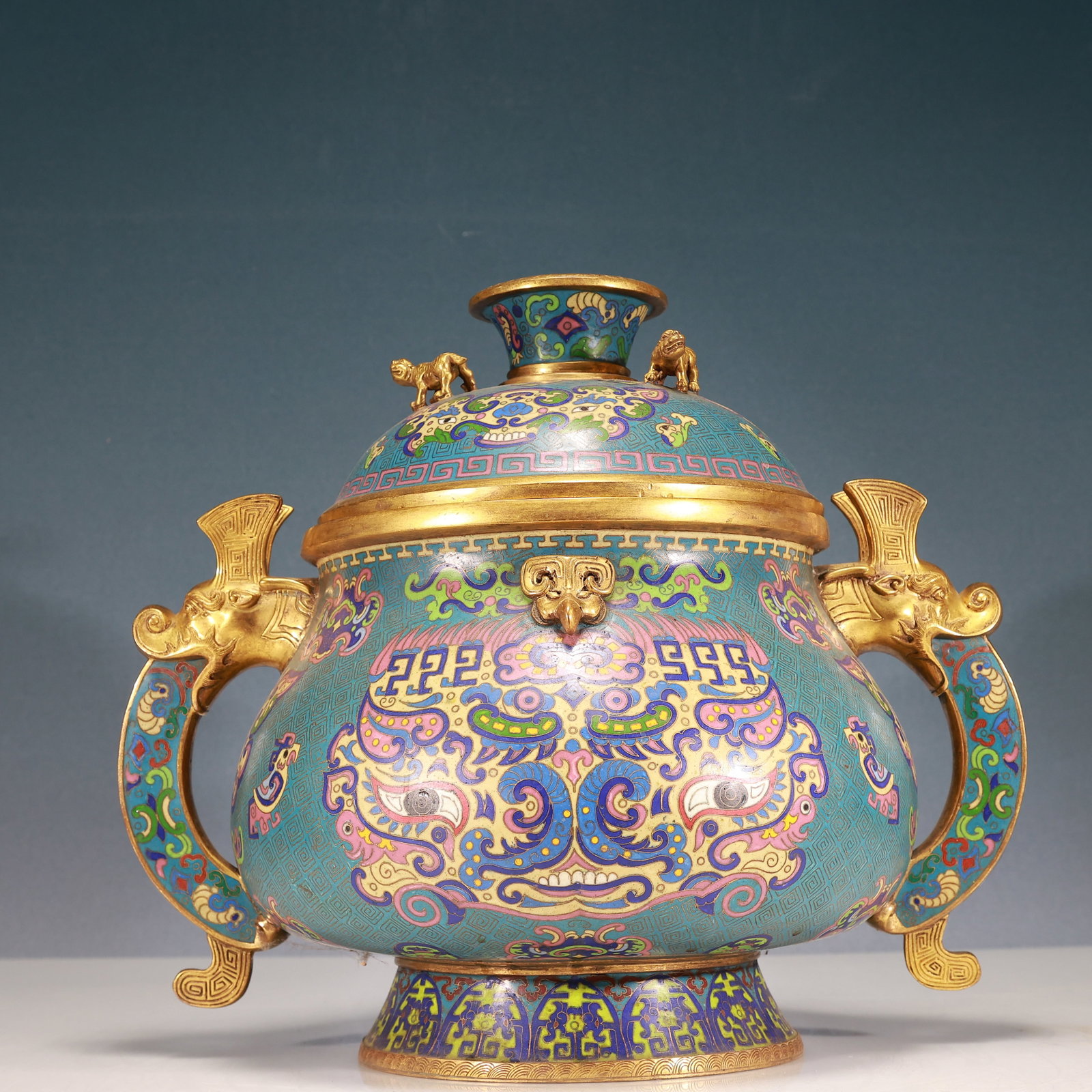 A Rare Cloisonne Beast-Face Pattern Double-Ears Censer: A Rare Cloisonne Beast-Face Pattern Double-Ears Censer,Qing Dynasty, China,Kangxi Four-character Mark,Size:14.6inx10.2inx13.8in,Weight:13000g