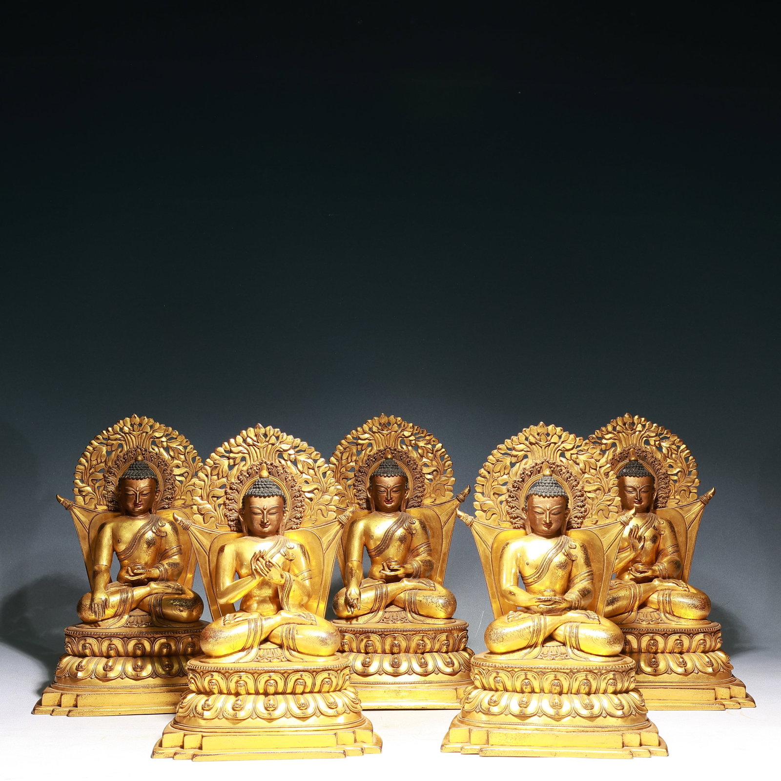 A Set of Solemn Gilt Bronze Statue of Sakyamuni: A Set of Solemn Gilt Bronze Statue of Sakyamuni,Ming Dynasty, China,Yongle Six-character Mark,Size:9.4inx6.7inx13.8in,Weight:7500g