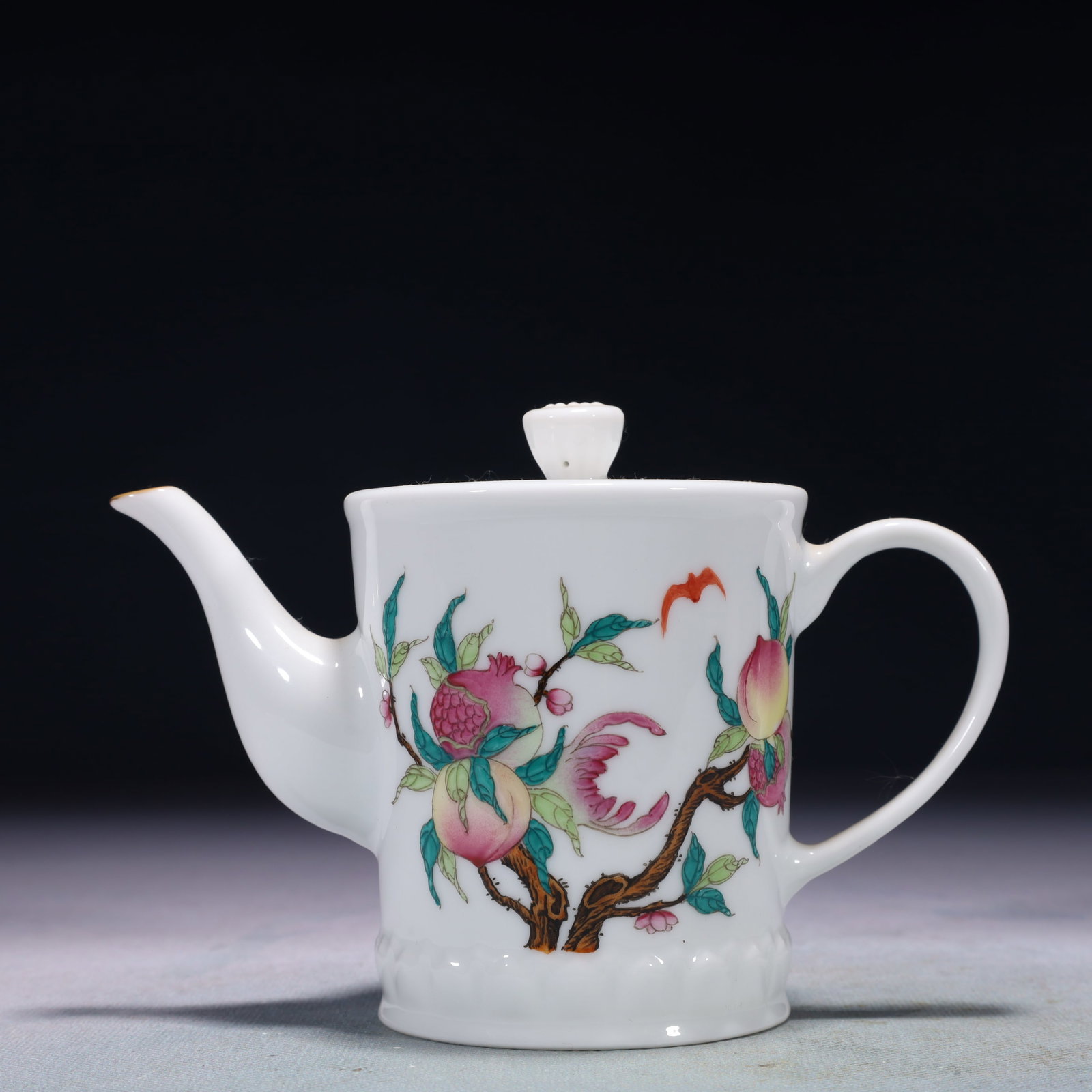 An Exquisite Famille-Rose Bats and Peach Pattern Teapot,with poem: An Exquisite Famille-Rose Bats and Peach Pattern Teapot,with poem,Qing Dynasty,China,Qianlong Four-character Mark,Size:6.3inx3.1inx4.1in,Weight:200g