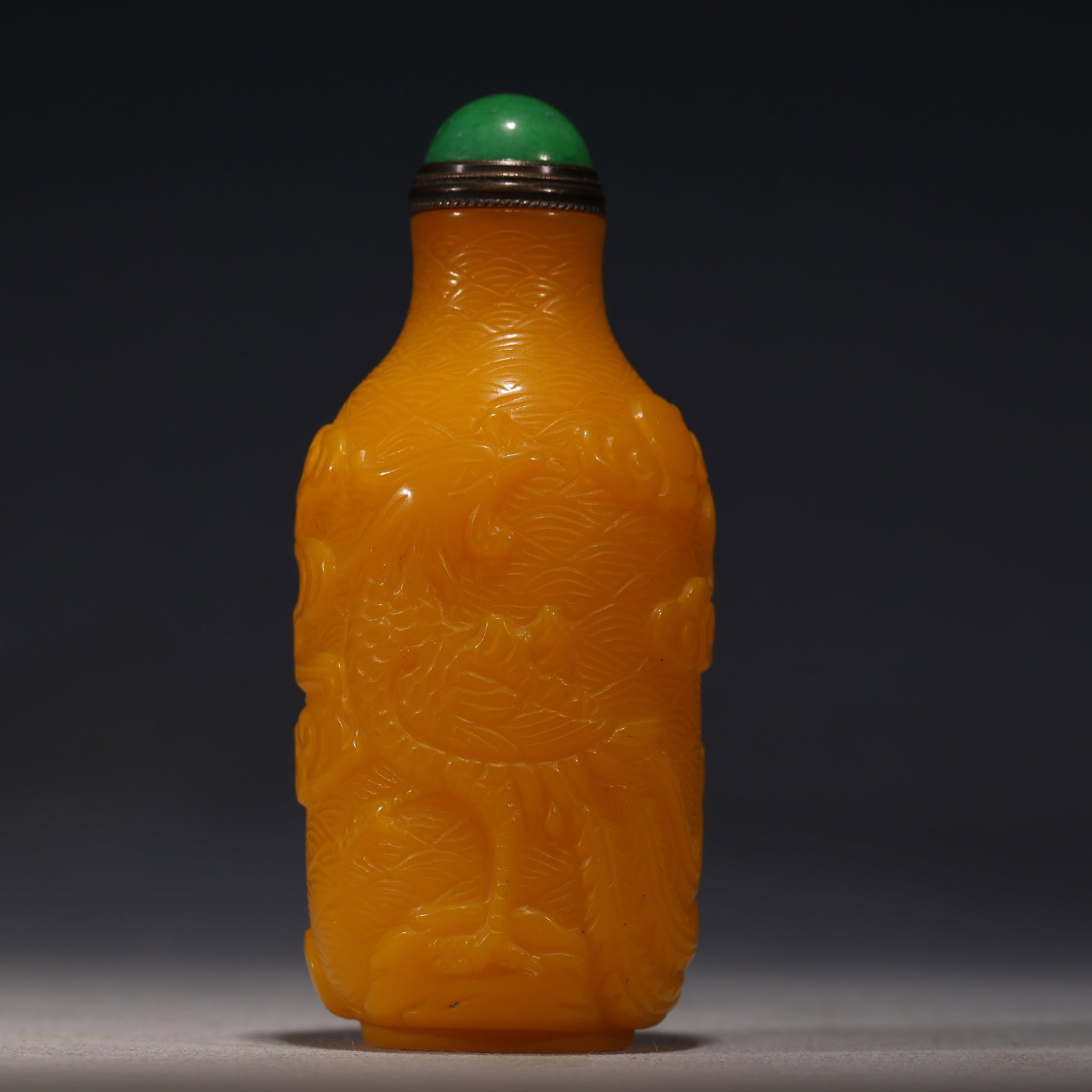 An Exquisite Chicken-fat Yellow Glass Sea Wave Cloud Phoenix Pattern Snuff Bottle: An Exquisite Chicken-fat Yellow Glass Sea Wave Cloud Phoenix Pattern Snuff Bottle,Qing Dynasty, China,Yongzheng Four-character Mark,Size:1.6in×1.6in×3.3in
