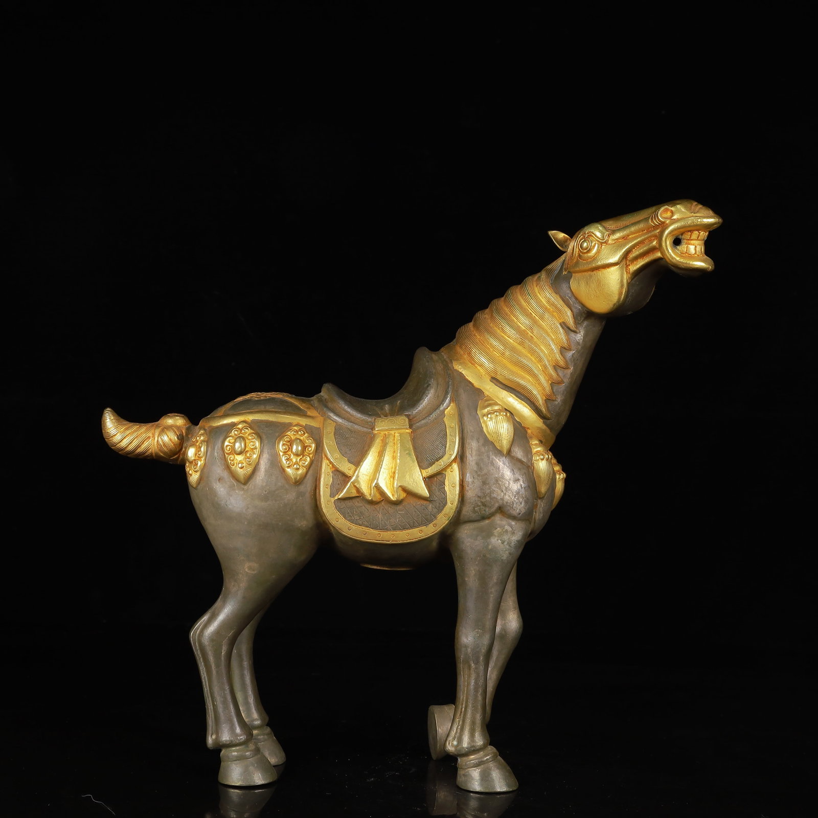 An Exquisite Gilt Silver Horse Ornament: An Exquisite Gilt Silver Horse Ornament,Tang Dynasty,China,Zhenguan Four-Character Mark,Size:11inx3.1inx10.2in,Weight:1450g 银鎏金马摆件,中国唐