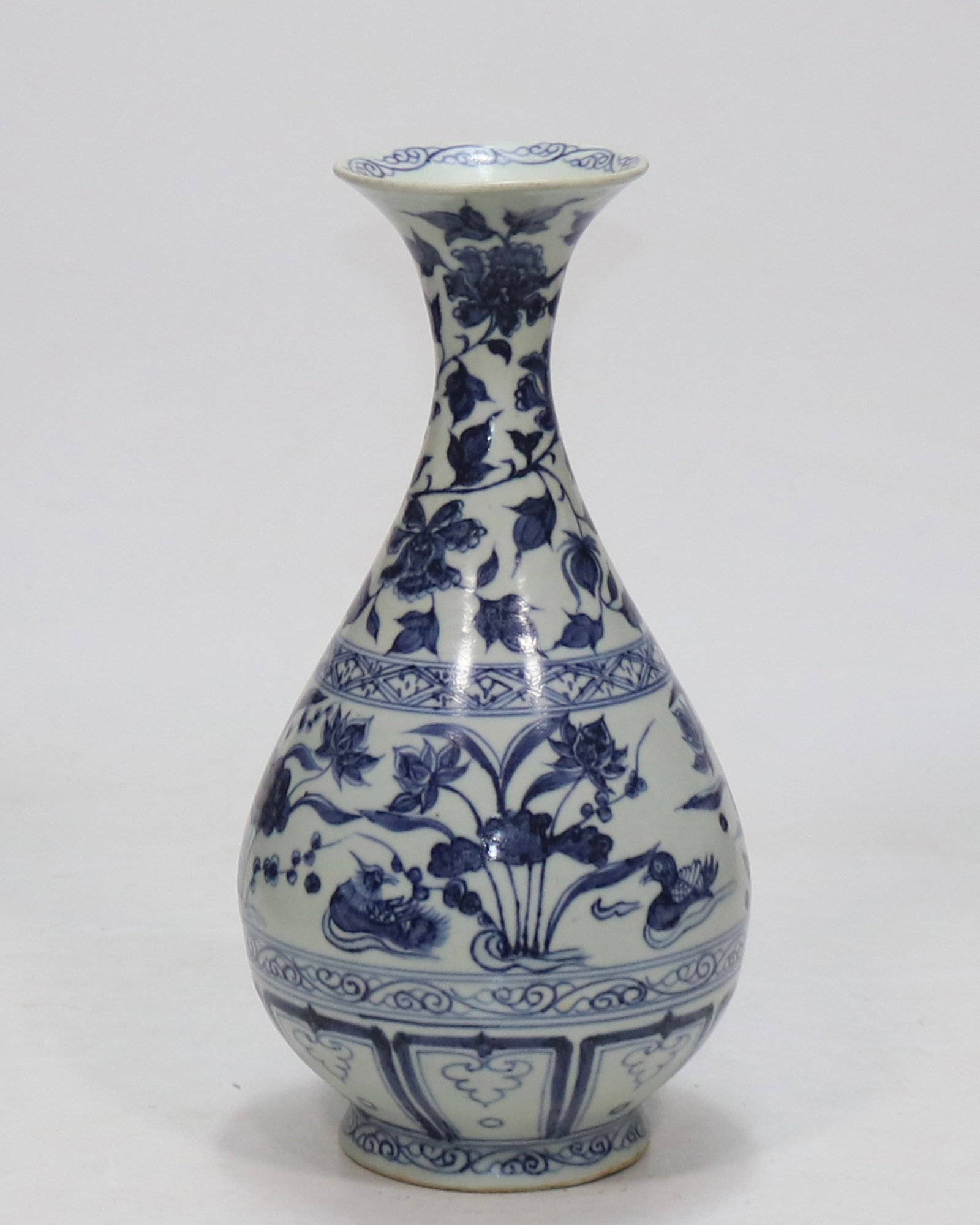 A fine blue and white pear-shaped yuhuchun vase with mandarin ducks resting on lotus pattern (1 of 8)