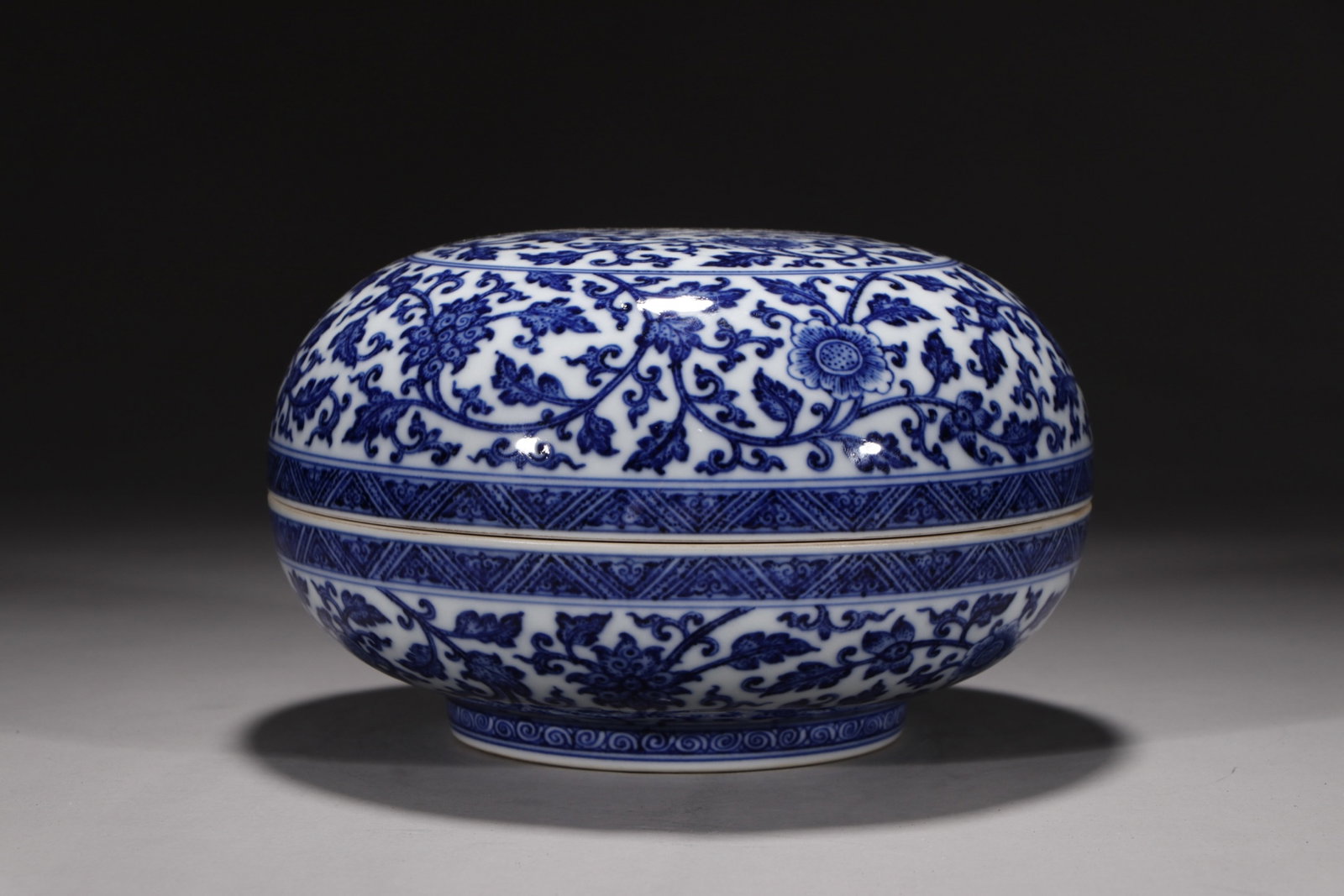An Exquisite Blue and White Lotus Pattern Box with Cover: An Exquisite Blue and White Lotus Pattern Box with Cover,Qing Dynasty,China,Qianlong Six-character Mark,Size:5.1inx8.2in