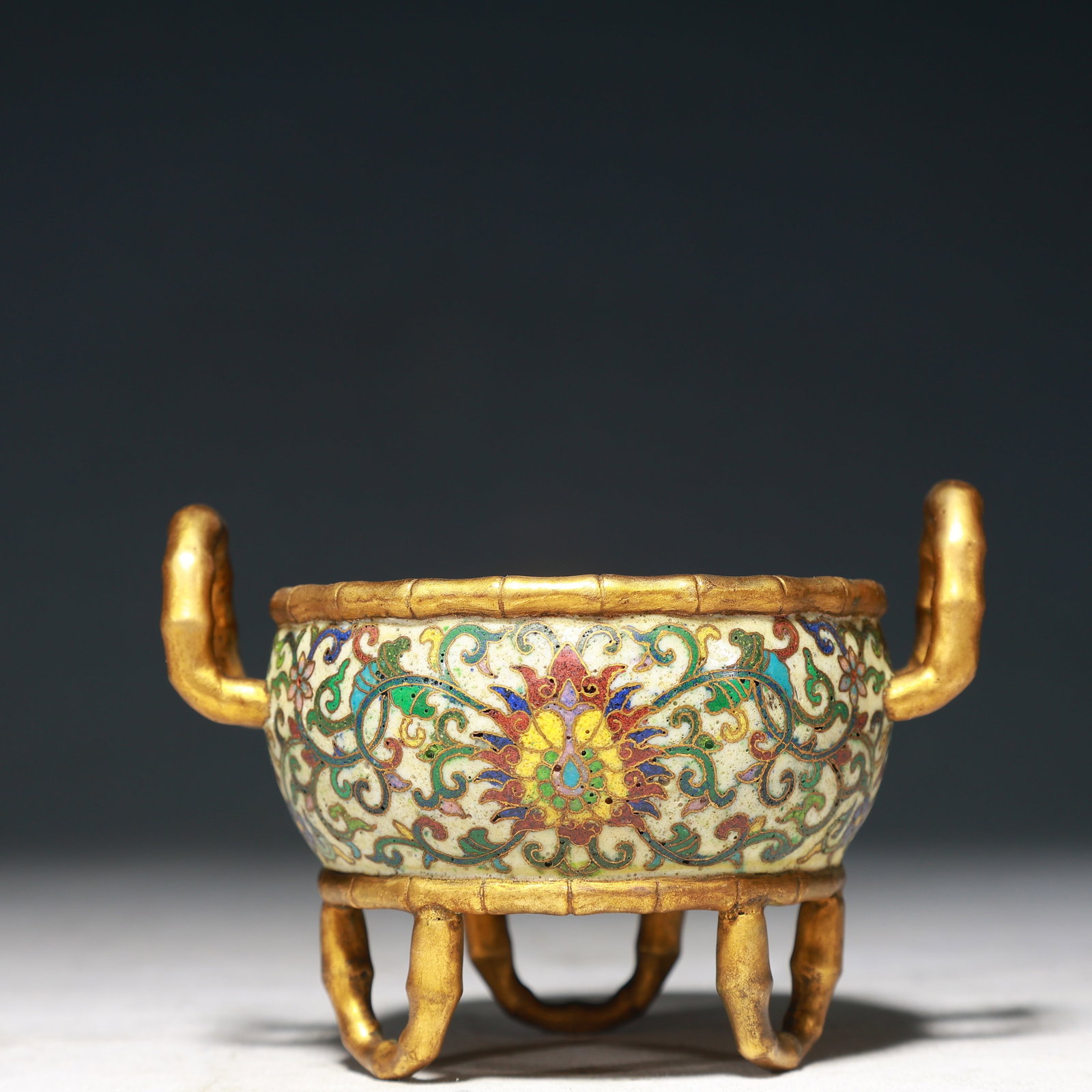 An Exquisite Cloisonne Lotus Pattern Double-Ears and Tripod Censer: An Exquisite Cloisonne Lotus Pattern Double-Ears and Tripod Censer,Qing Dynasty,China,Qianlong Four-character Mark,Size:4.5inx3.5inx3.1in,Weight:400g 景泰蓝缠枝莲&#