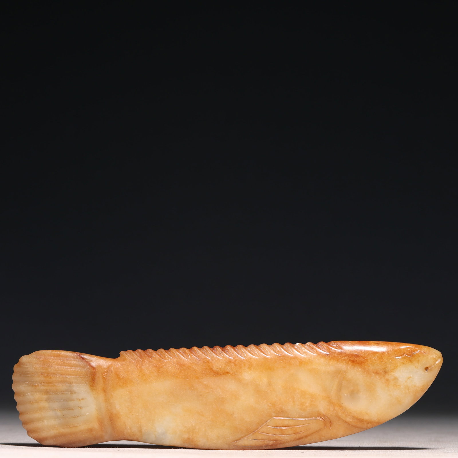 An Archaic Hongshan Culture White Jade Fish Pendant (1 of 9)