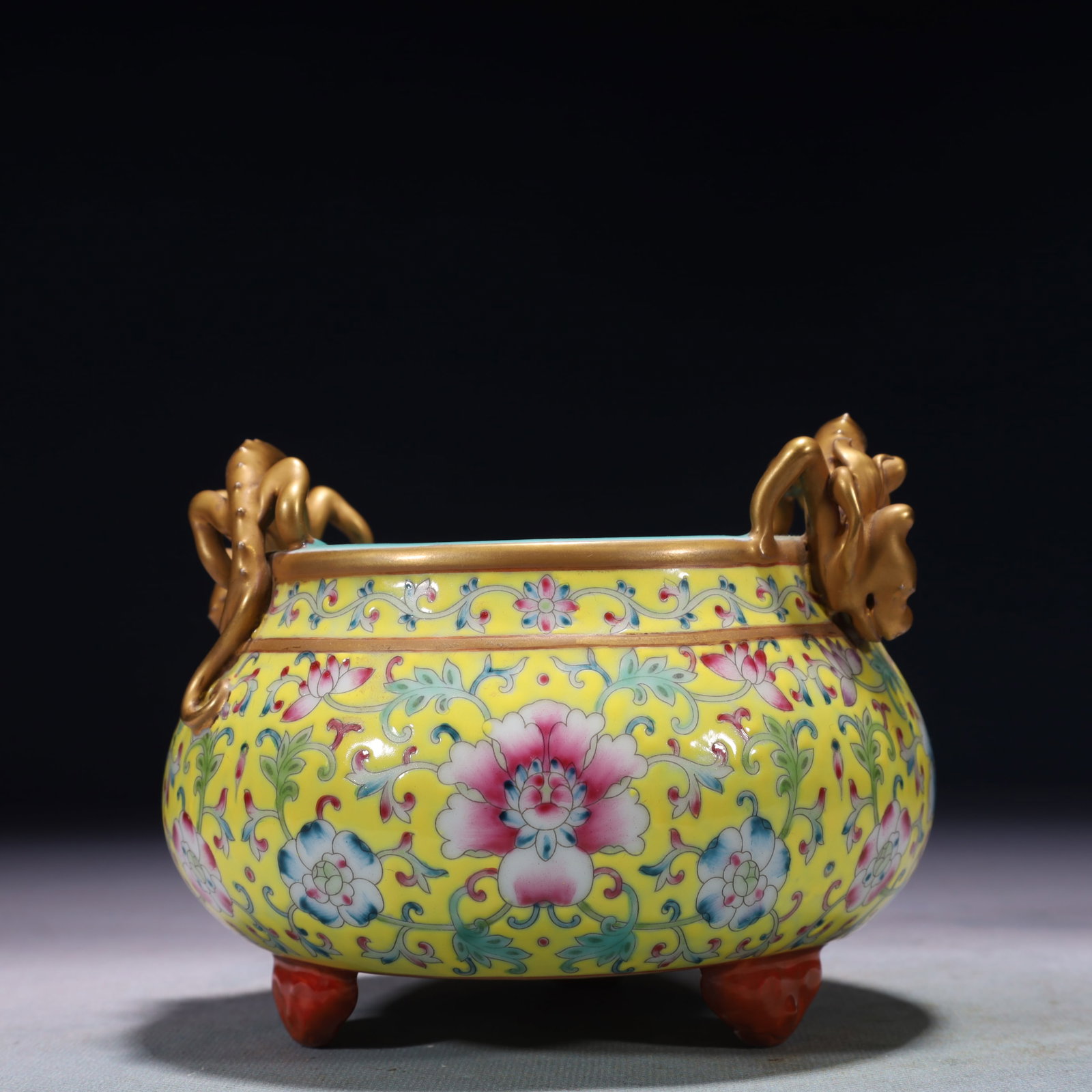 An Exquisite Yellow Ground Famille-Rose Lotus Pattern Double-Ears and Tripod Censer: An Exquisite Yellow Ground Famille-Rose Lotus Pattern Double-Ears and Tripod Censer,Qing Dynasty,China,Yongzheng Four-character Mark,Size:5.5inx4.7in,Weight:650g