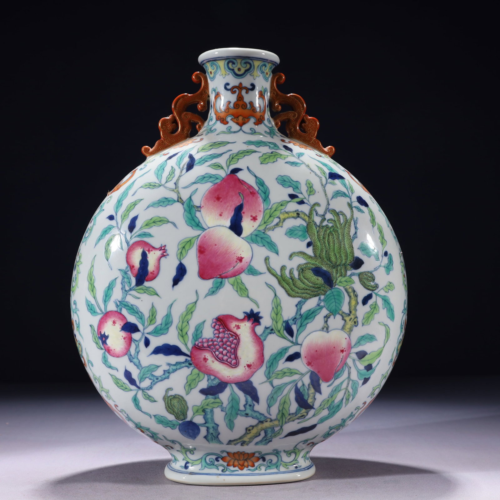 An Exquisite Blue and White Doucai Peach Pattern Double-Ears Vase: An Exquisite Blue and White Doucai Peach Pattern Double-Ears Vase,Qing Dynasty,China,Qianlong Six-character Mark,Size:9.8inx3.9inx13in,Weight:3500g 青花斗彩桃子 