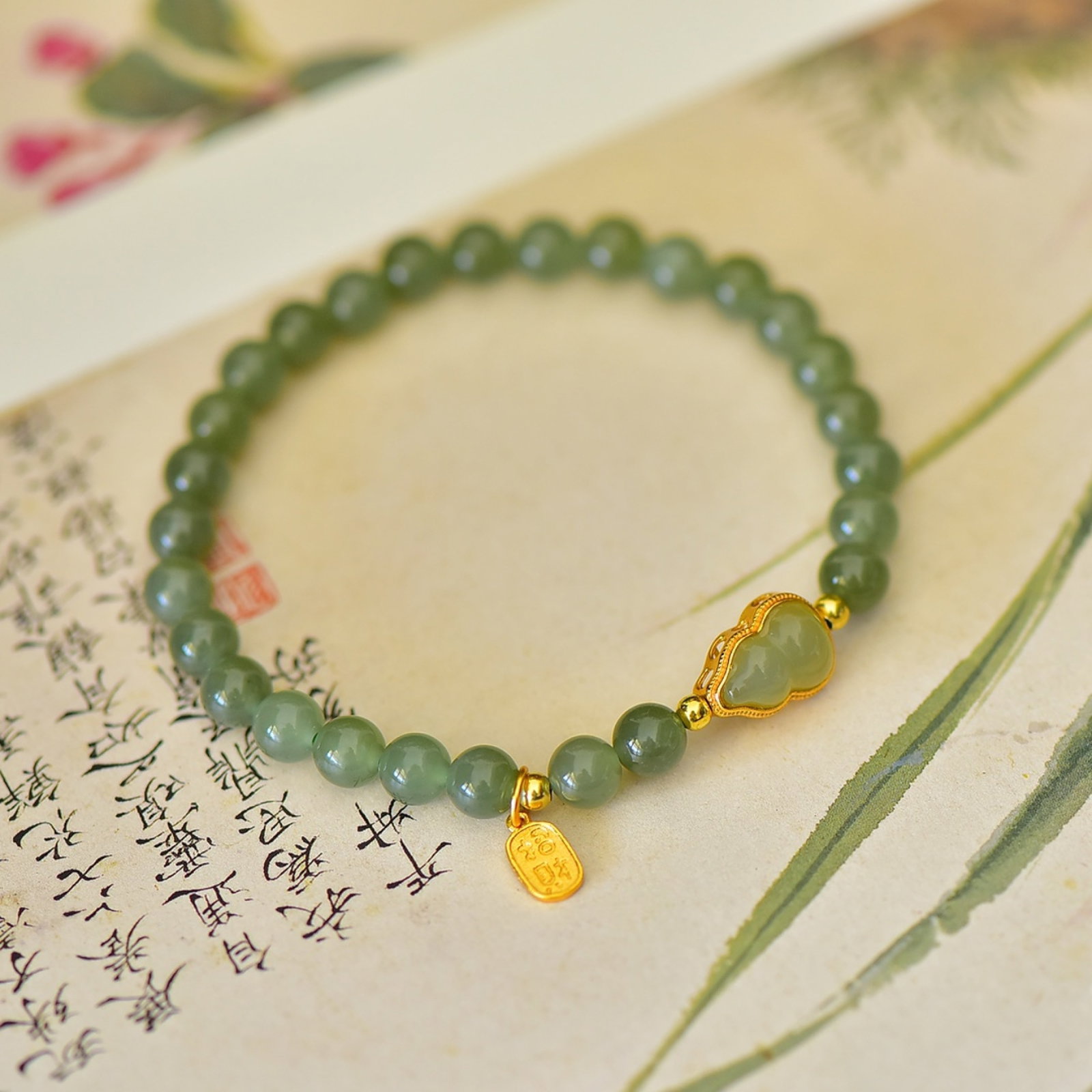 An Exquisite Sterling Silver-Gold Plated Inlaid Jasper Bracelets: An Exquisite Sterling Silver-Gold Plated Inlaid Jasper Bracelets,Size:6mmx6mm 纯银镀金镶碧玉手串