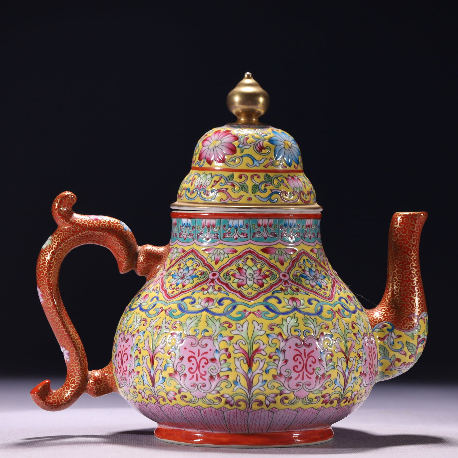 An Exquisite Yellow Ground Enamel Painted Gold Lotus Pattern Ewer: An Exquisite Yellow Ground Enamel Painted Gold Lotus Pattern Ewer,Qing Dynasty,China,Yongzheng Four-character Mark,Size:7.9inx5.1inx7.1in,Weight:783g