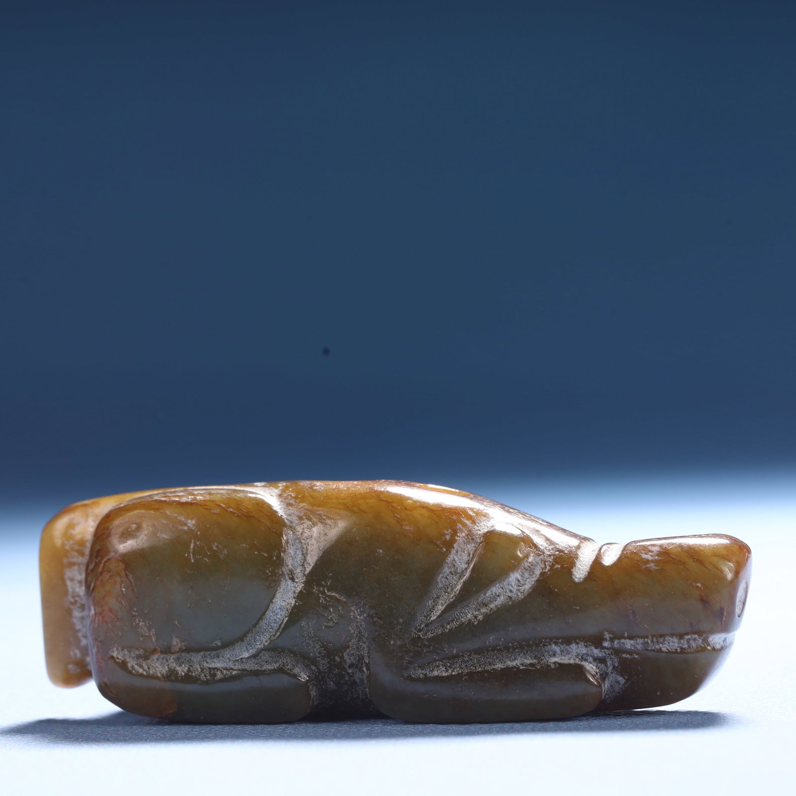 An Archaic Hongshan Culture Greenish Jade Animal Ornament: An Archaic Hongshan Culture Greenish Jade Animal Ornament,Ancient Time,China,Size:2.8inx0.7inx0.9in,Weight:55.2g 红山文化青白玉动物摆件
