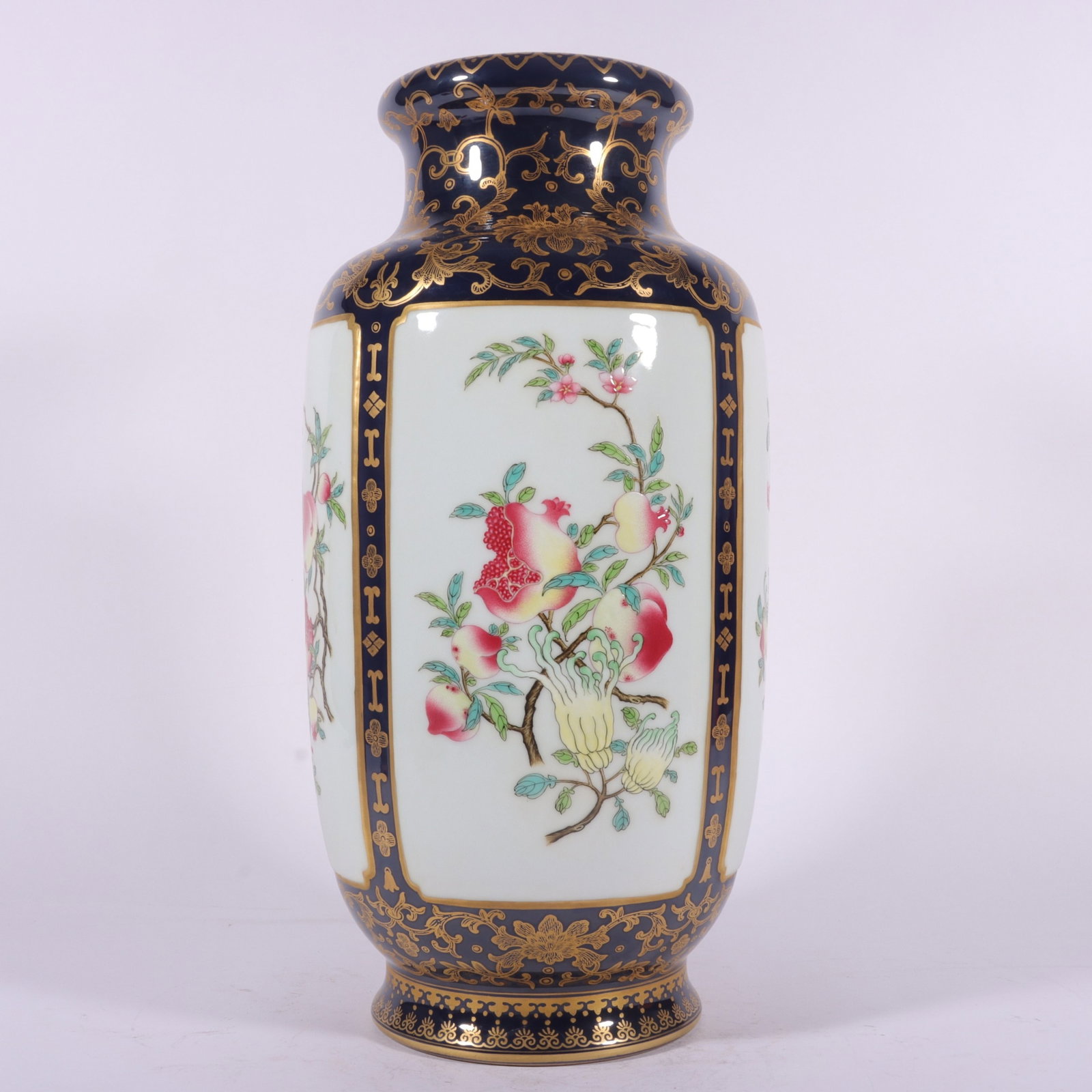 A Rare Ji Blue Glazed Enamel Painted Gold Flower and Fruit Pattern Vase: A Rare Ji Blue Glazed Enamel Painted Gold Flower and Fruit Pattern Vase,Qing Dynasty,China,Qianlong Six-character Mark,Size:14.6inx7.1in 霁蓝釉珐琅彩描金