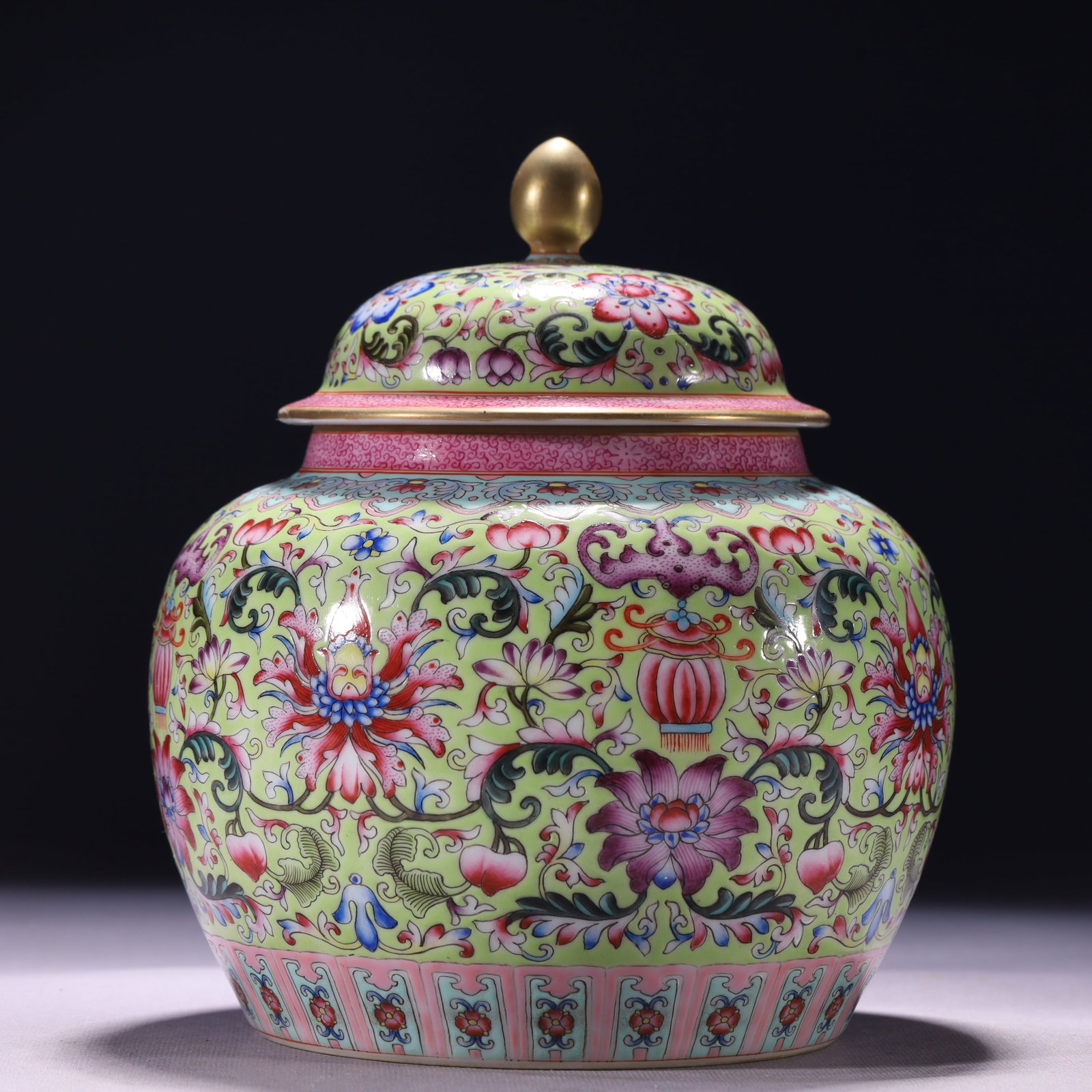 An Exquisite Green Ground Enamel Lotus Pattern Jar with Cover: An Exquisite Green Ground Enamel Lotus Pattern Jar with Cover,Qing Dynasty,China,Qianlong Four-character Mark,Size:6.7inx7.9in,Weight:1449g 绿地珐琅彩缠枝!