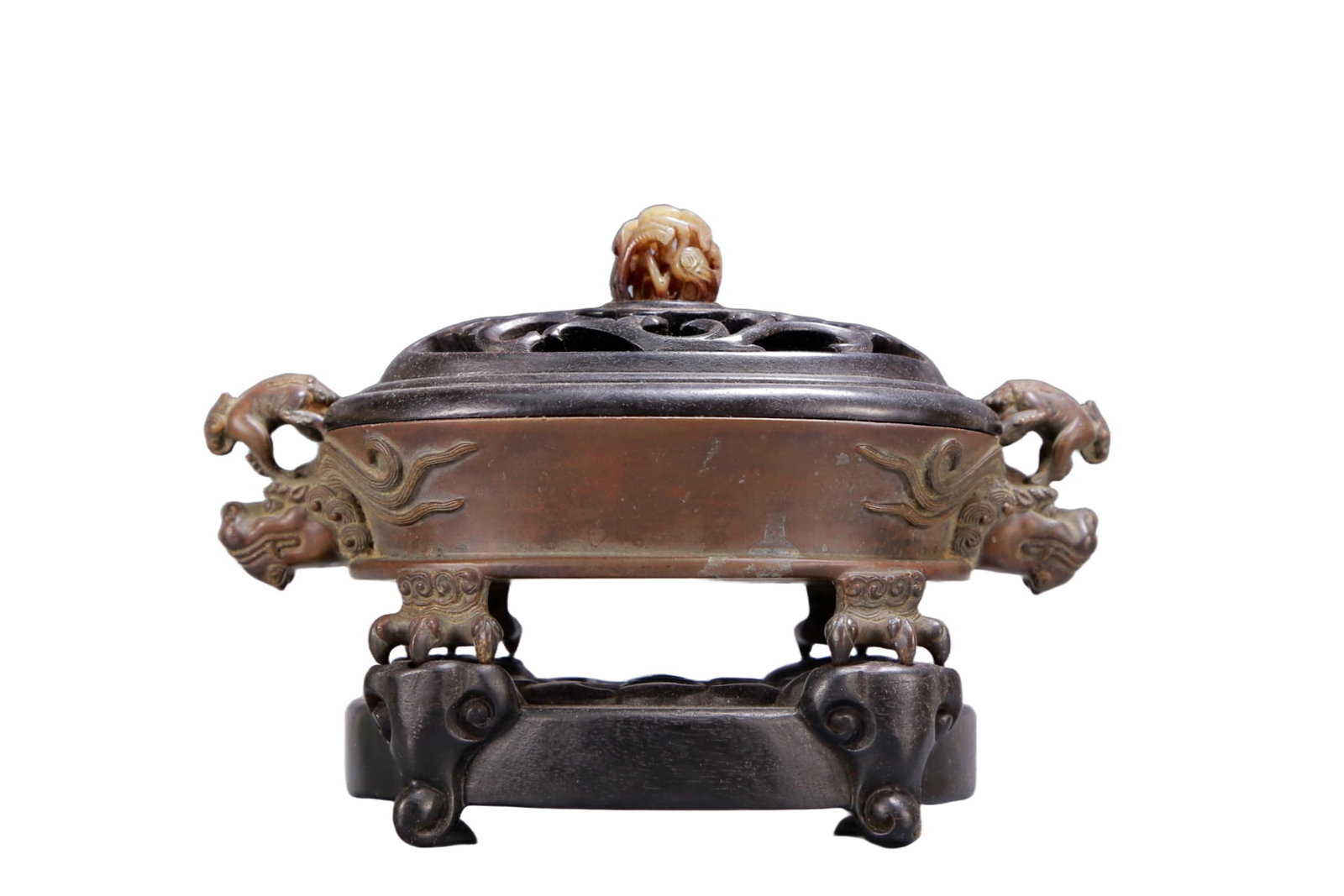 An Archaic Bronze Beast-Ears Censer,with Zitanwood Inlaid White Jade Cover: An Archaic Bronze Beast-Ears Censer,with Zitanwood Inlaid White Jade Cover,Qing Dynasty, China,Daoguang Five-character Mark,Size:8.3inx4.3inx5.5in,Weight:1550g 铜兽耳香炉