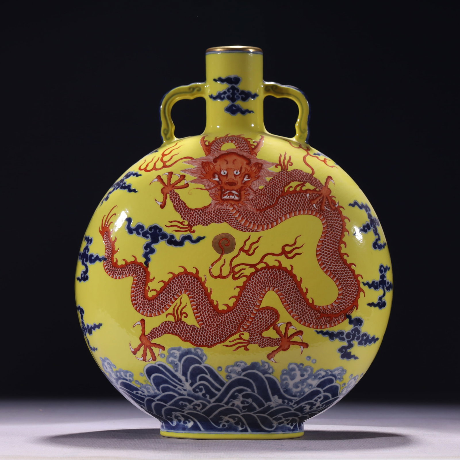 An Exquisite Blue and White Iron-Red Painted Gold Auspicious Cloud and Dragon Pattern Double-Ears: An Exquisite Blue and White Iron-Red Painted Gold Auspicious Cloud and Dragon Pattern Double-Ears Vase,Qing Dynasty,China,Qianlong Six-character Mark,Size:9.8inx3.9inx13in,Weight:3450g 青花
