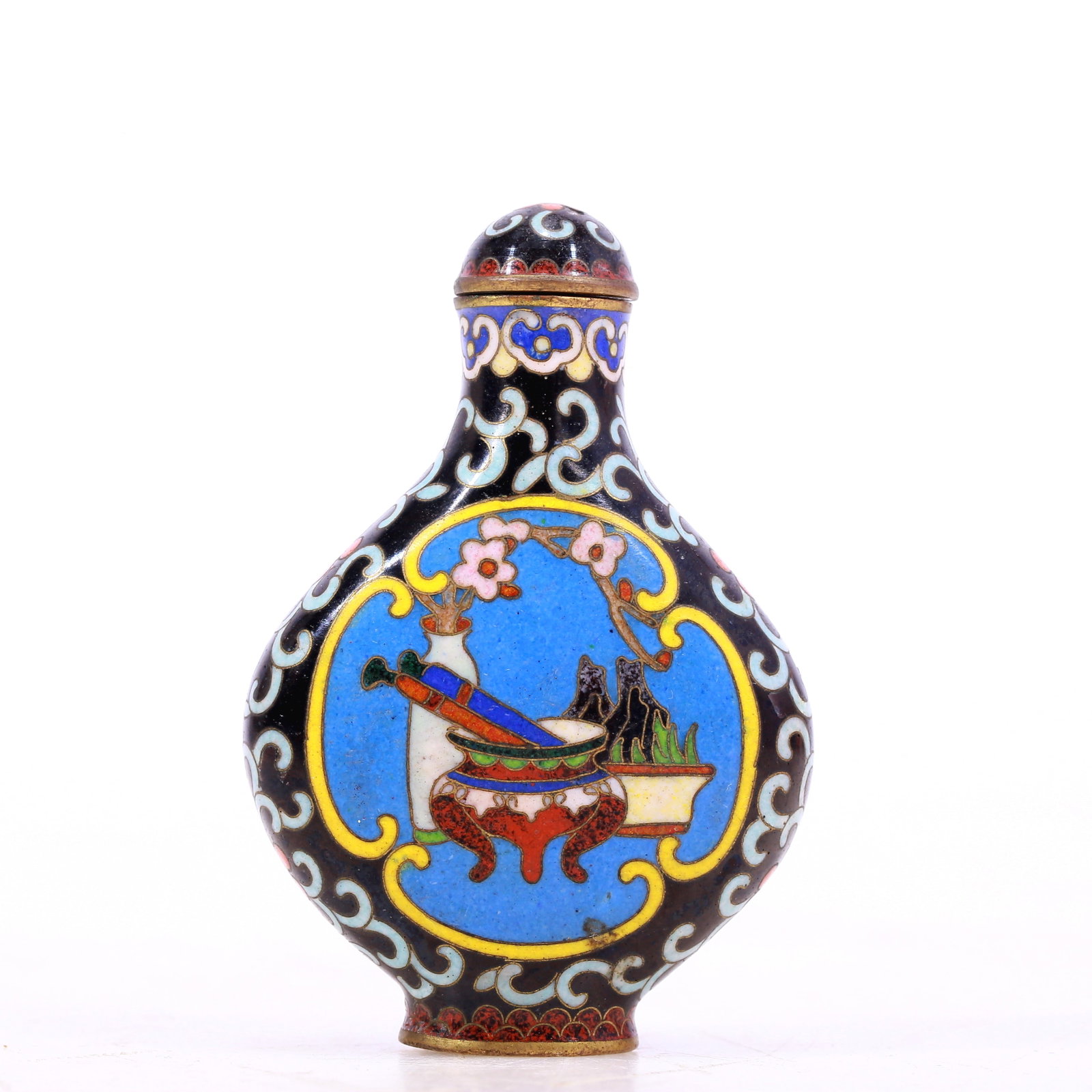A Gorgeous Cloisonne 'Stationery' Snuff Bottle: A Gorgeous Cloisonne 'Stationery' Snuff Bottle. Enameled in polychrome with various patterns, all reserved on a bright turquoise ground. Chinese Qing Dynasty. Qianlong Four-Character Mark. Size:1.8inx