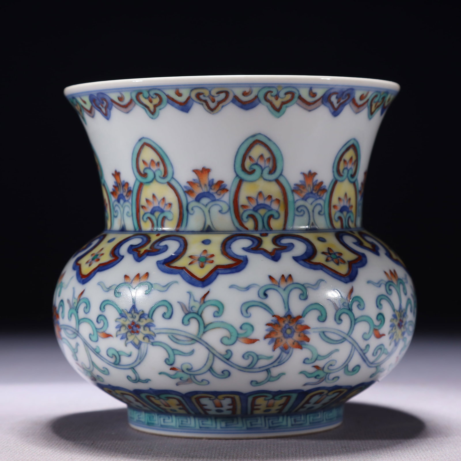 An Exquisite Blue and White Doucai Lotus Pattern Jar: An Exquisite Blue and White Doucai Lotus Pattern Jar,Qing Dynasty,China,Qianlong Six-character Mark,Size:4.5inx4.6in,Weight:500g 青花斗彩缠枝莲纹罐