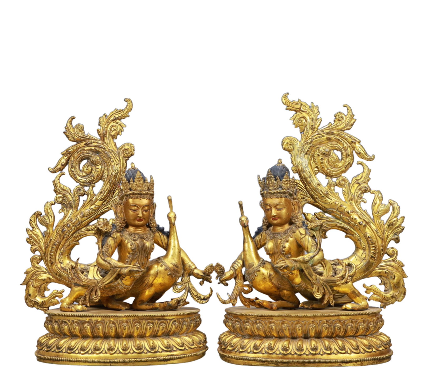 A Pair of SolemnGilt Bronze Statue of Mahamayuris: A Pair of SolemnGilt Bronze Statue of Mahamayuris,Ming Dynasty, China,Size:10.2inx7.5inx17.3in Weight:25900g 一对铜鎏金孔雀明王像,中&#