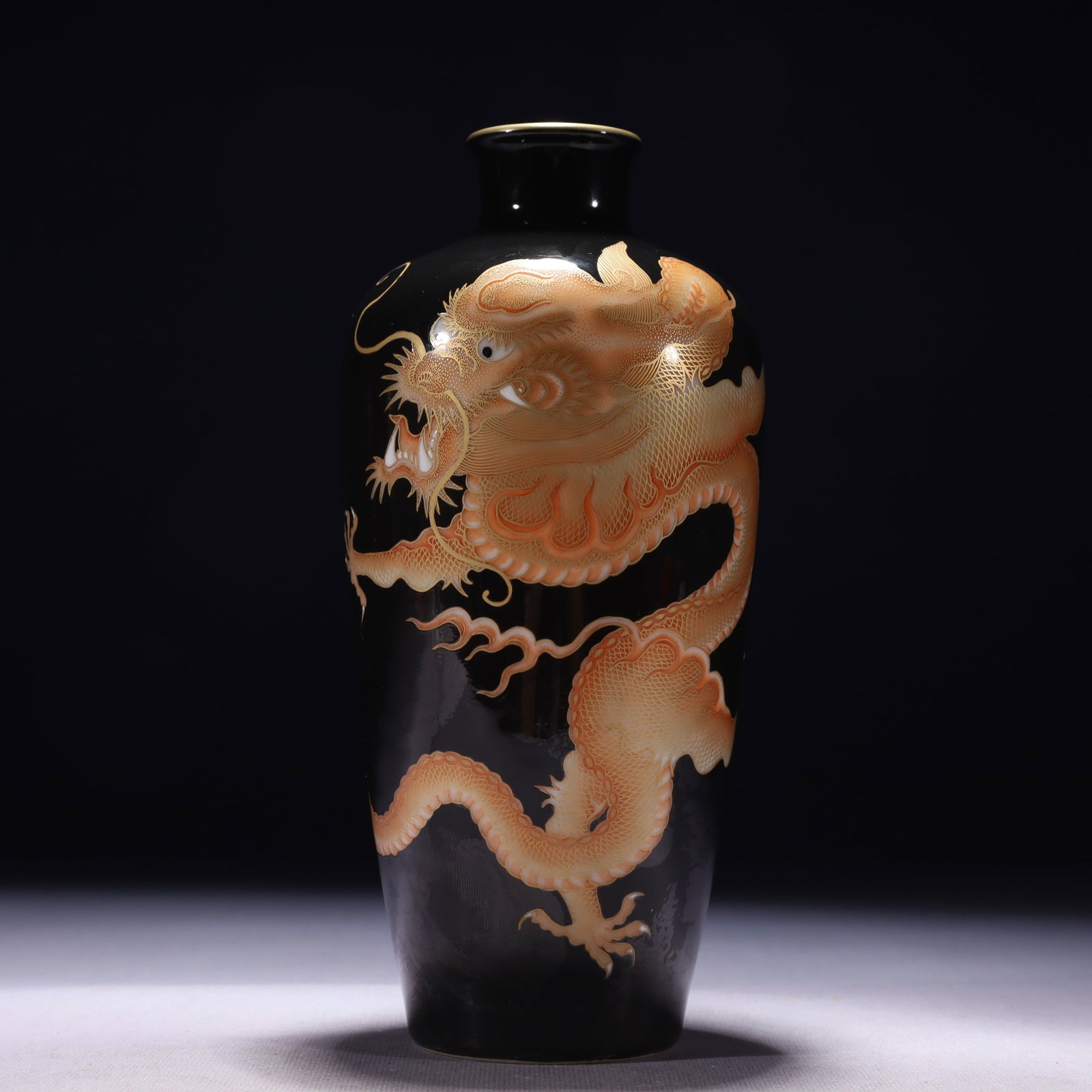 An Exquisite Black Ground Iron-Red Painted Gold Auspicious Cloud and Dragon Pattern Vase: An Exquisite Black Ground Iron-Red Painted Gold Auspicious Cloud and Dragon Pattern Vase,Qing Dynasty,China,Qianlong Six-character Mark,Size:3.9inx9.1in,Weight:800g 黑地矾红