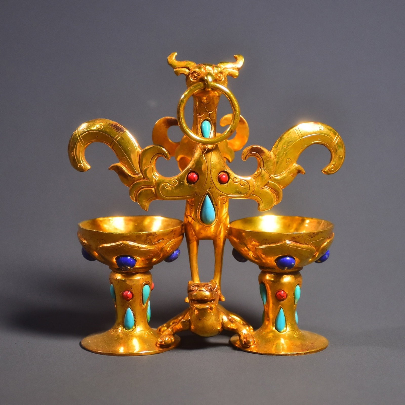 An Exquisite Gilt Bronze Inlaid Turquoise Phoenix-Shaped Candlestick,Inlaid Lapis Lazuli: An Exquisite Gilt Bronze Inlaid Turquoise Phoenix-Shaped Candlestick,Inlaid Lapis Lazuli,Qing Dynasty,China,Size:4.7inx4.7in,Weight:523g 铜鎏金镶绿松石凤