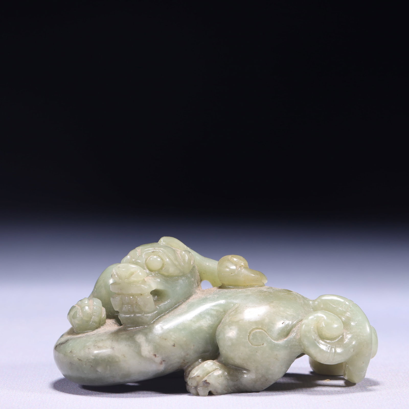 An Exquisite Green Jade Beast Ornament (1 of 11)