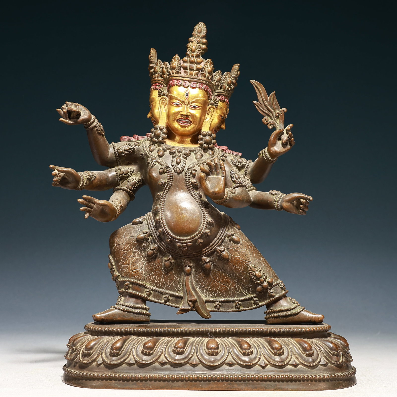 A Solemn Gilt Bronze Six-arms Buddha Statue: A Solemn Gilt Bronze Six-arms Buddha Statue,Qing Dynasty,China,Size:9.8inx4.7inx13in,Weight:6350g 铜鎏金六臂佛像,中国清代